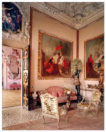Here is an over-the-top interior using tiger and leopard designed by Tony Duquette for the Rosekran's apartment in the Palazzo Brandolini on the Grand Canal in Venice. Even the seams of the room and framing on the paintings are finished in tiger and leopard.