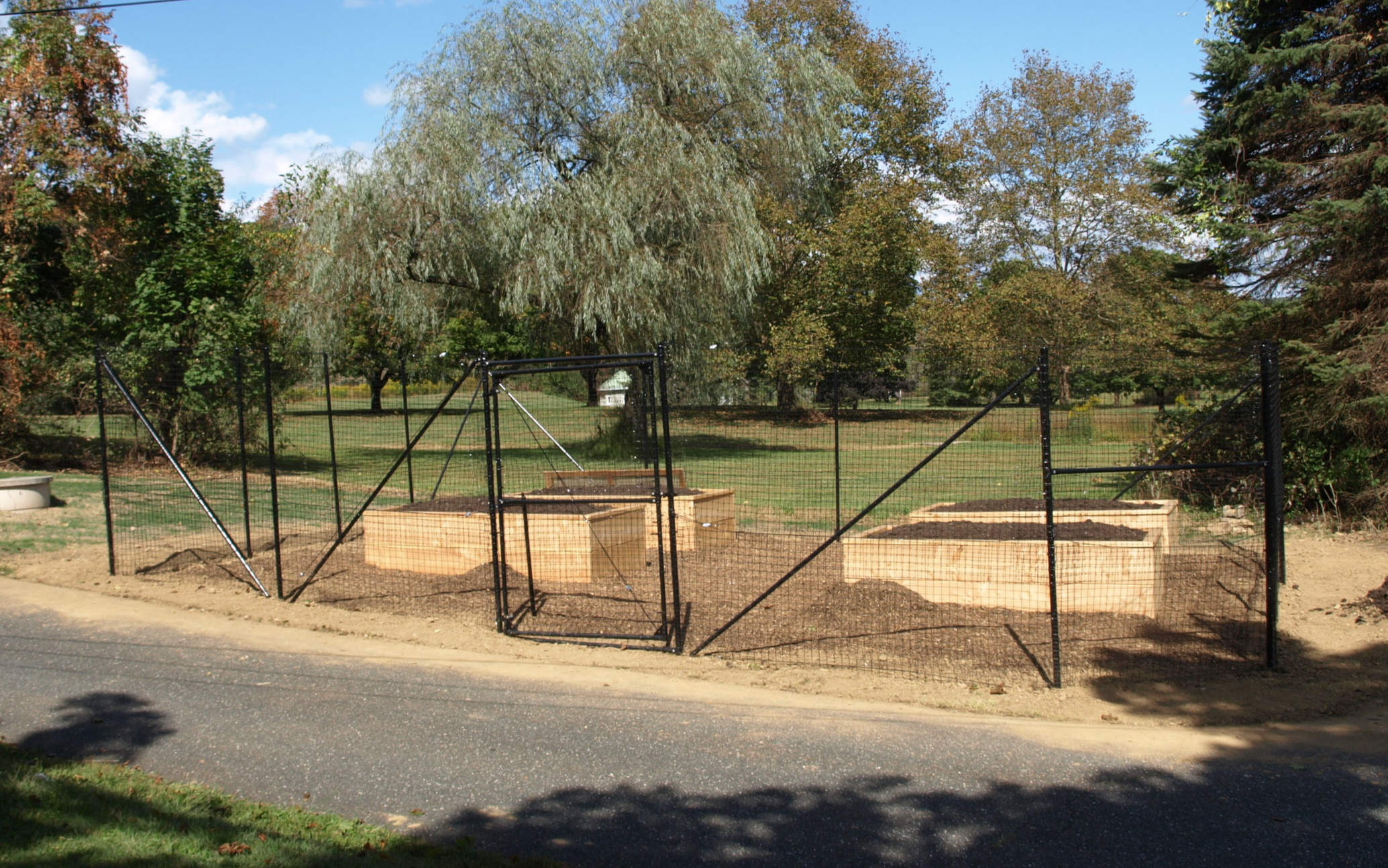 Garden Fence Installation Project with In ground Rodent protection — The  Benner Deer Fence Company