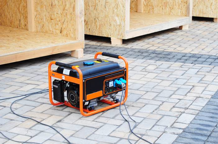 Consider getting a home generator to keep the lights on in the event of a post-storm power outage. But make sure you don't run it inside your house. (Photo: iStock)