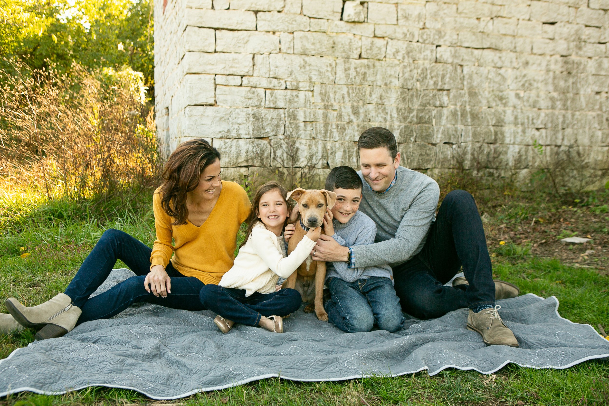 family photo with kids and the family dog