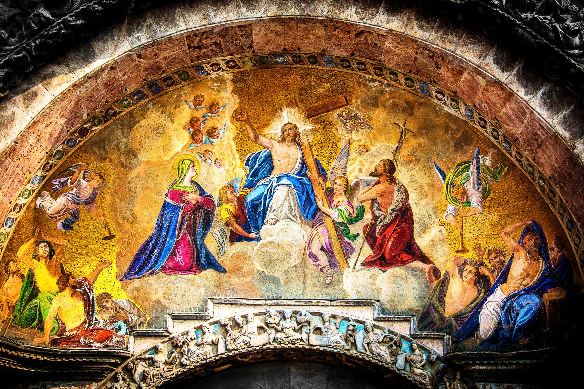 Tile mosaic in the portico of the Basilica San Marco in Venice, Italy