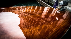 Palazzo Reflections in a Water Taxi's Shiny Deck