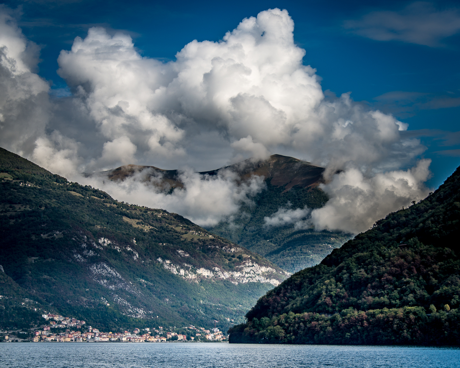 Lago di Como is surrounded by mountains...and the auto road that ends at Bellagio can be seen cutting across the hill on the right