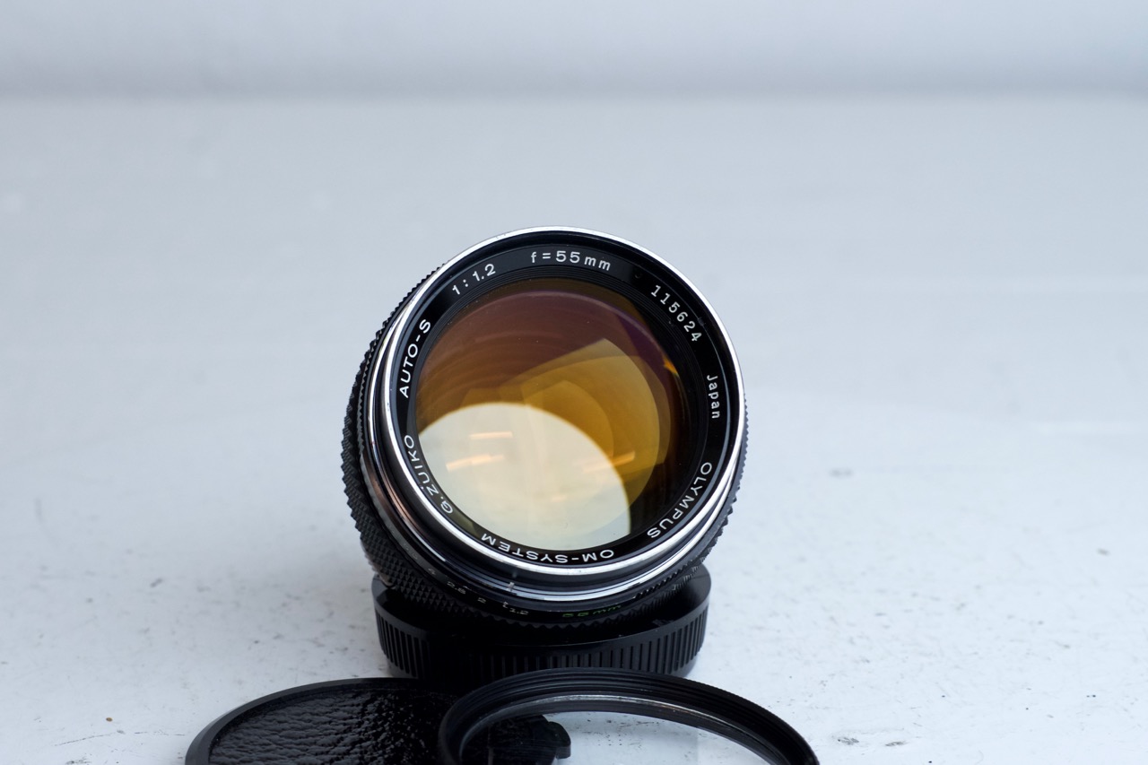 Olympus Zuiko OM-System Auto-S 55mm F/1.2 Prime Lens - With Caps and UV Filter
