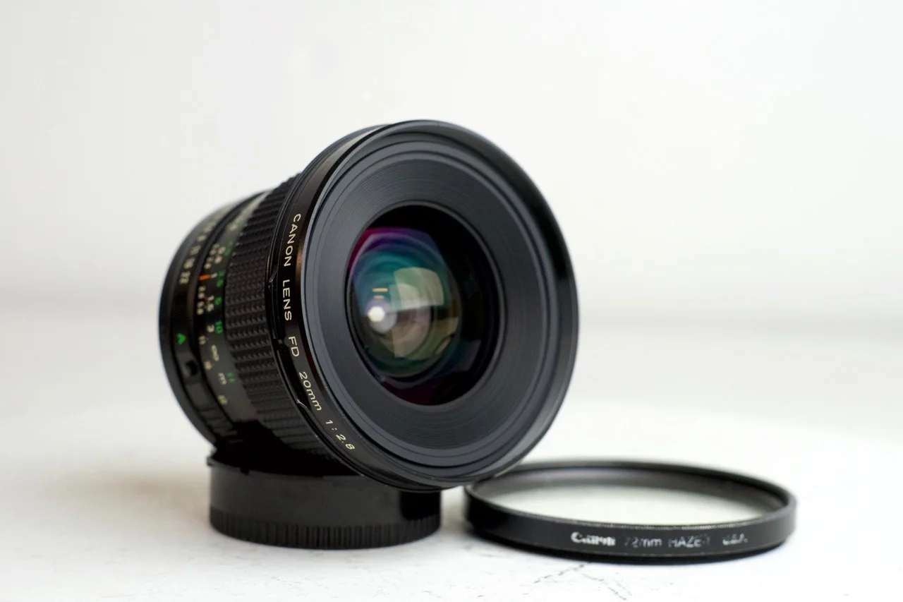Canon New FD 20mm F/2.8 Prime Wide Angle Lens for FD Mount with UV filter and Rear Cap
