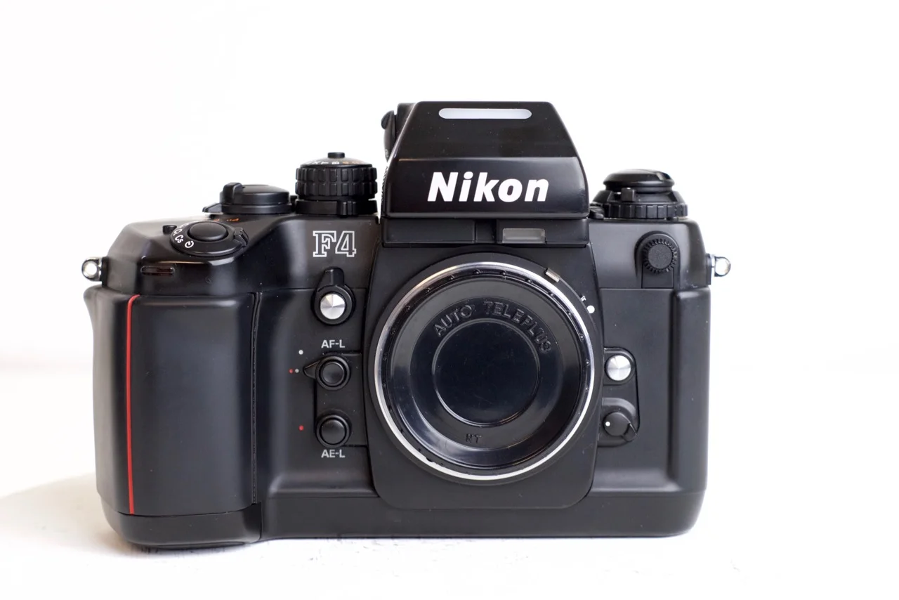 Nikon F4 (F4S) Professional 35mm Film SLR Camera with MB-21 Battery Grip and DP-20 Prism