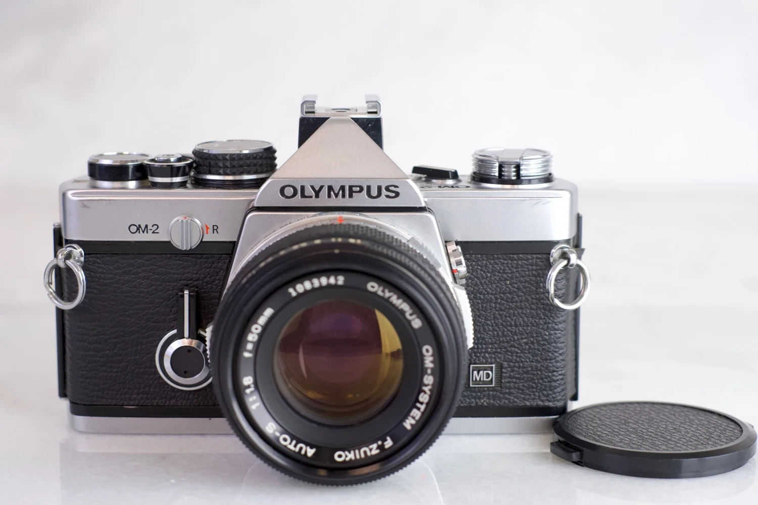 Olympus OM-2 35mm Film SLR Camera with Olympus Zuiko 50mm F 1.4 Fast Prime Lens, Lens Cap, UV Filter, Manual, Case, New Batteries