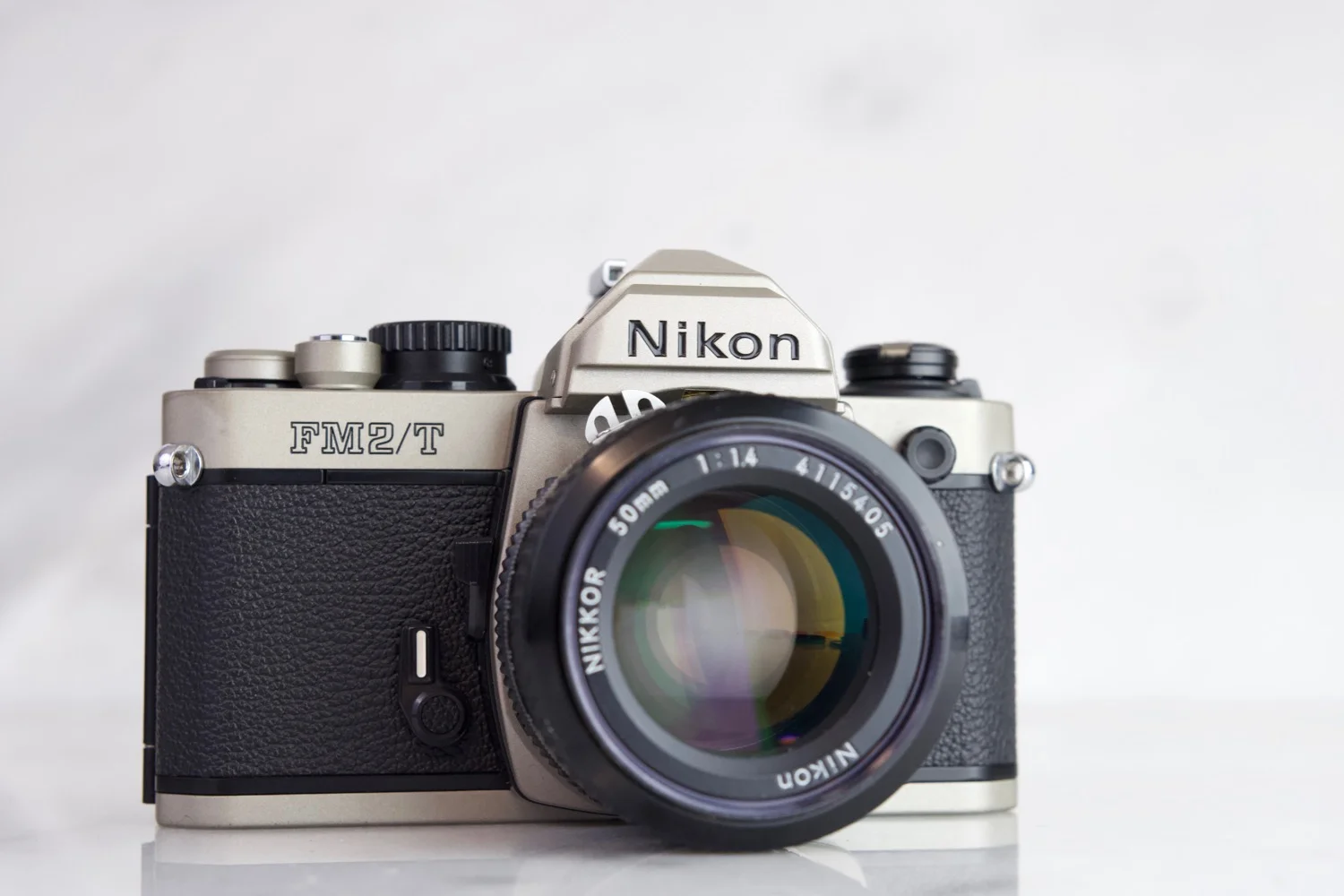 Nikon FM2/T 35mm Film SLR Camera with Nikon Nikkor 50mm F/1.4 Fast Prime Lens, Lens Cap and Batteries - Fully Functional
