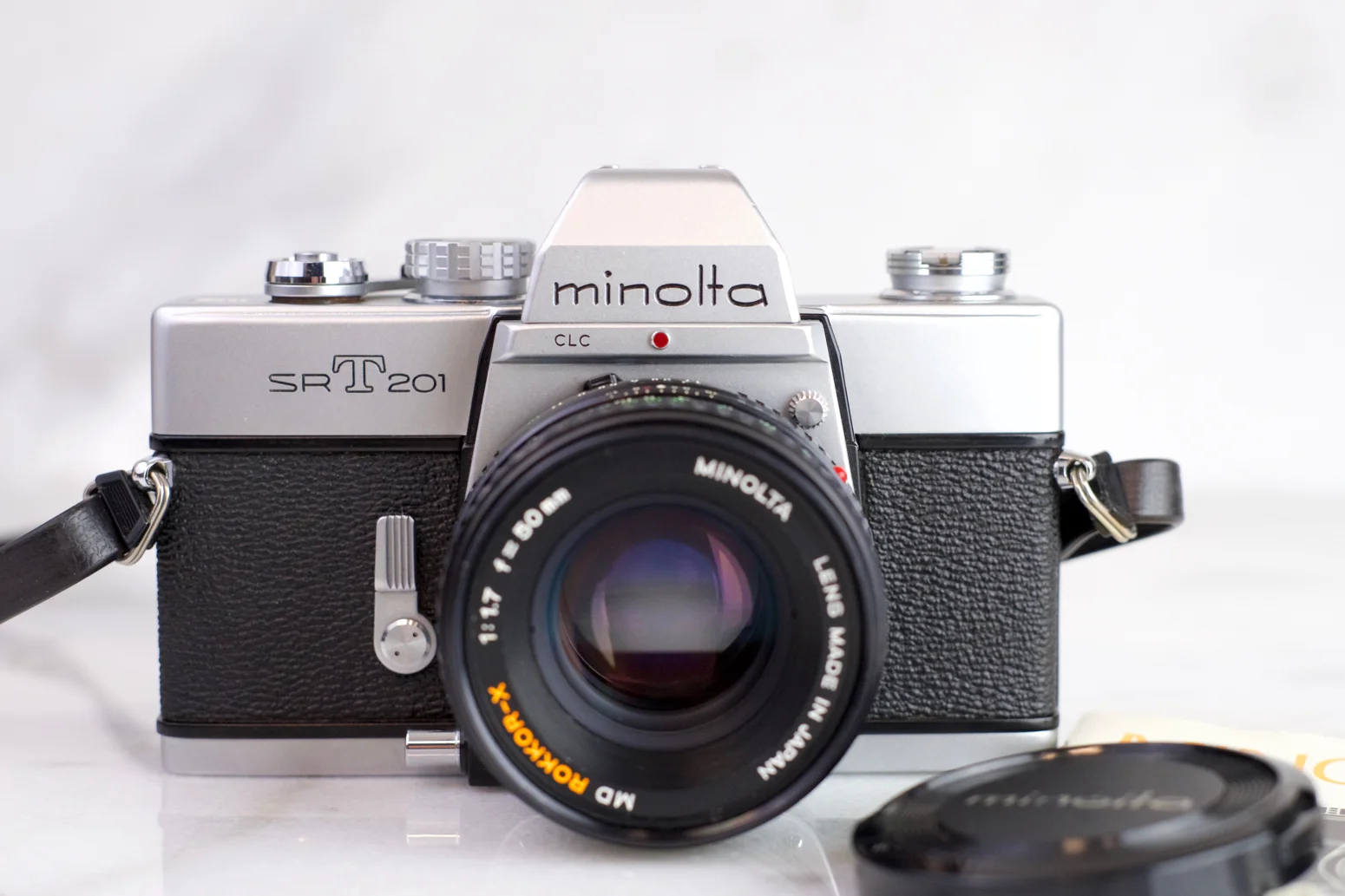 Minolta SRT 102 Mirror Lock Up Version 35mm Film Camera with Minolta MC Rokkor - PF 50mm f/1.7 Prime Lens, Filter, Screw on Metal Lens Cap