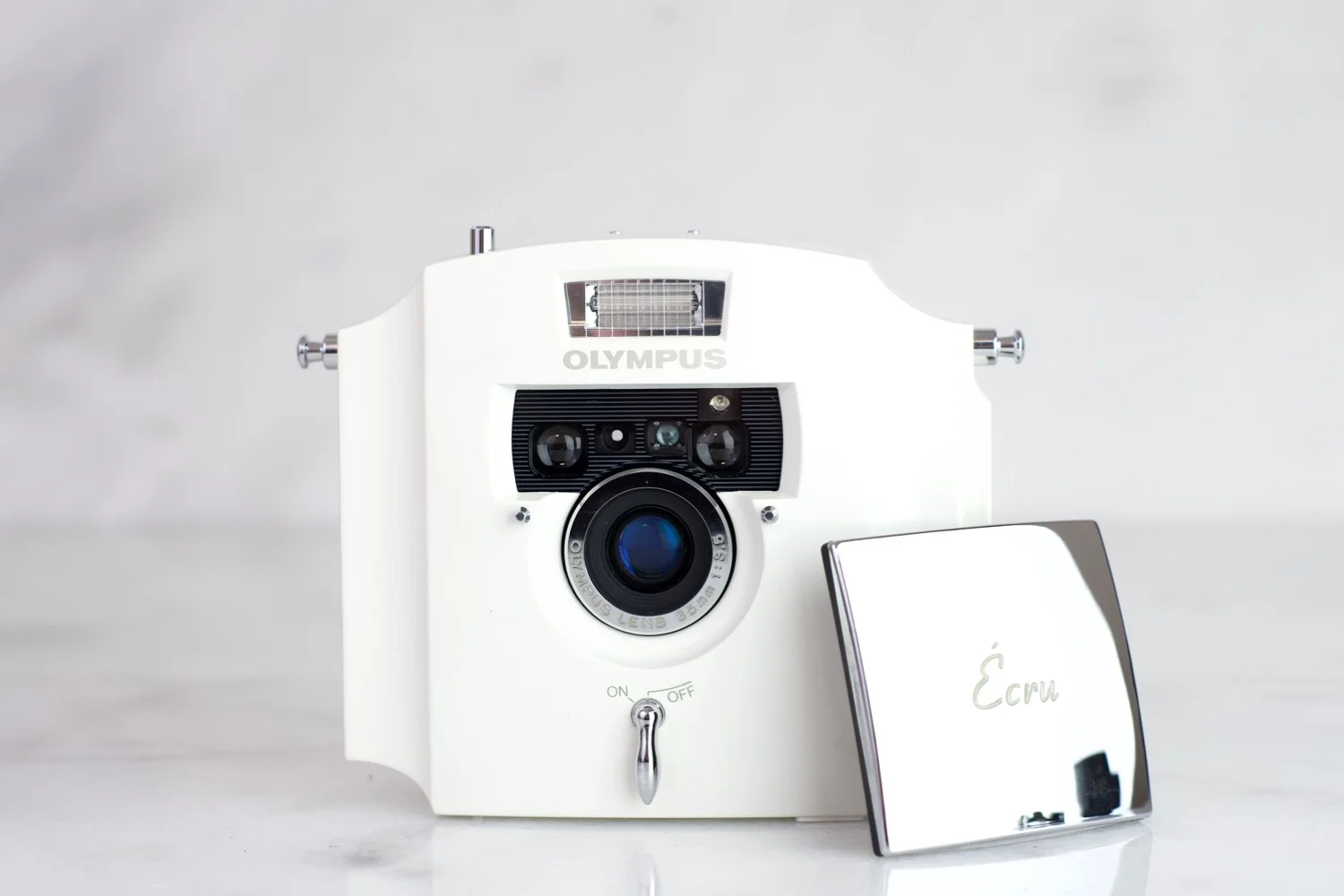 Olympus Ecru 35mm Point and Shoot Film Camera with Lens Cap