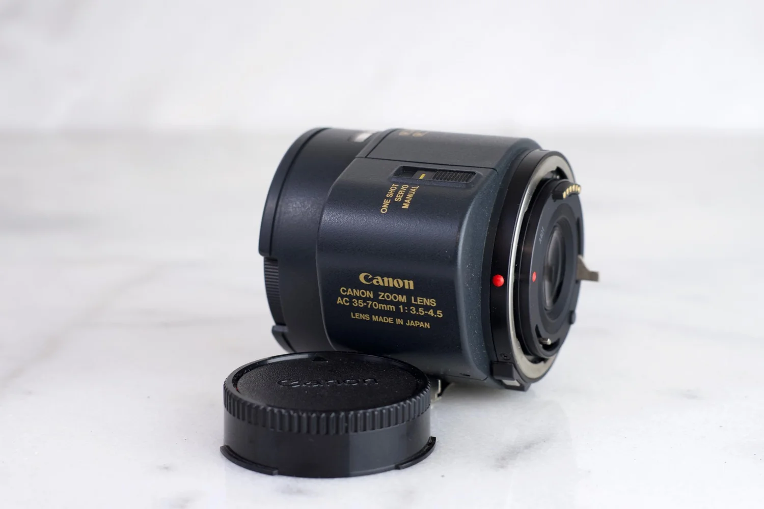 Canon AC Zoom Lens FD 35-70mm F/3.5-4.5 with Rear Cap - For Canon FD Mount Camera