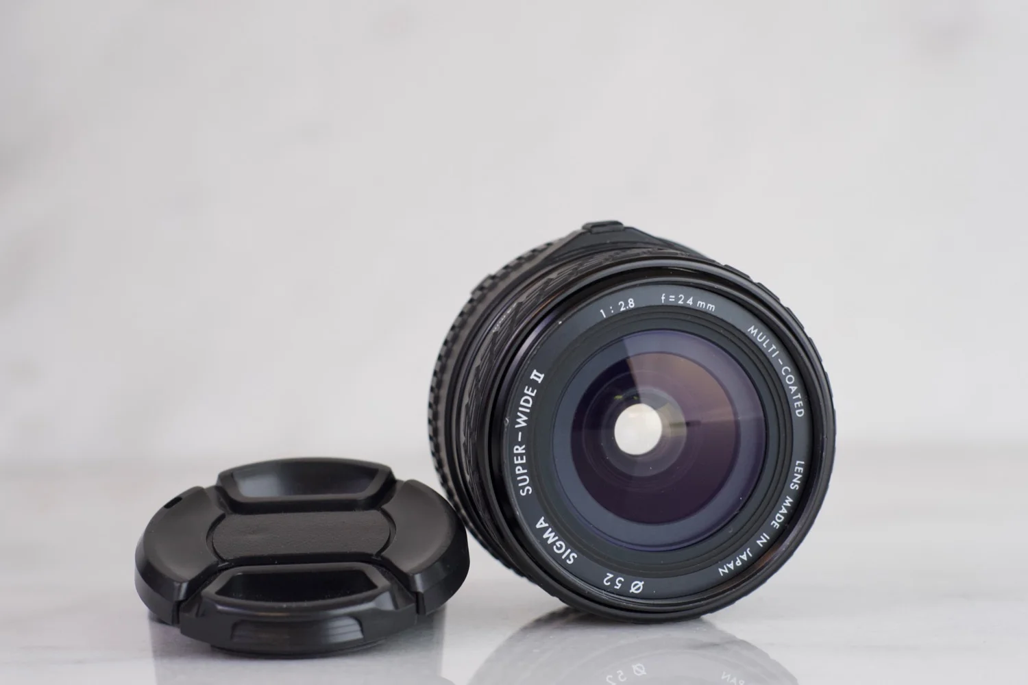 Minolta MC/MD Mount Sigma 24mm F/2.8 Super-Wide Angle Lens with Front and Rear Caps