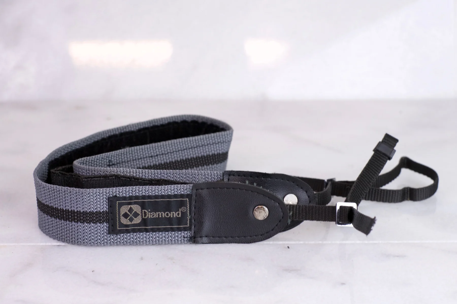 Grey and Black Camera Strap