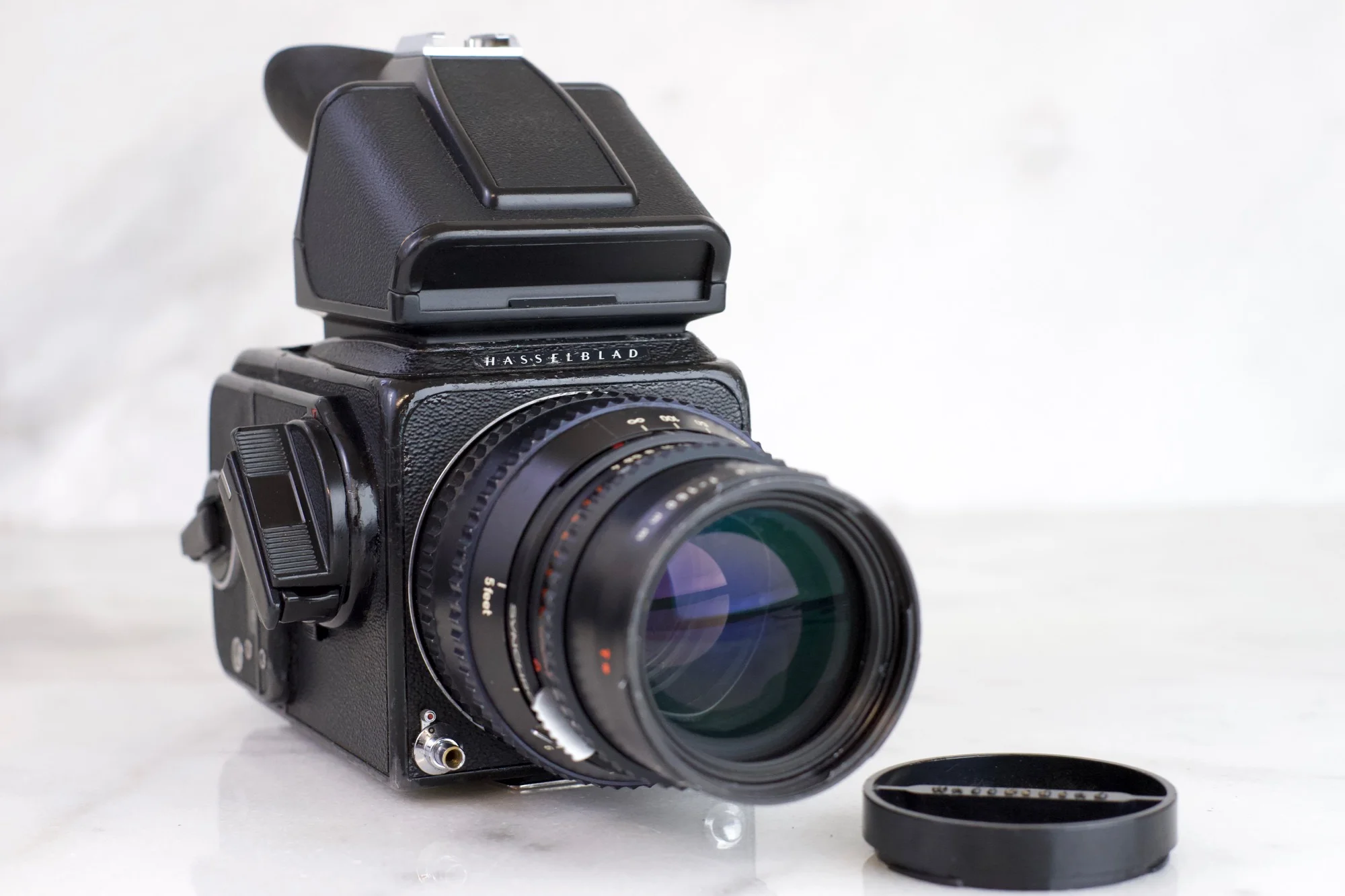 Hasselblad 500 CM with Carl Zeiss Sonnar T* 150mm F/4 Lens, A12 Film Back, Prism Viewfinder, Lens Cap
