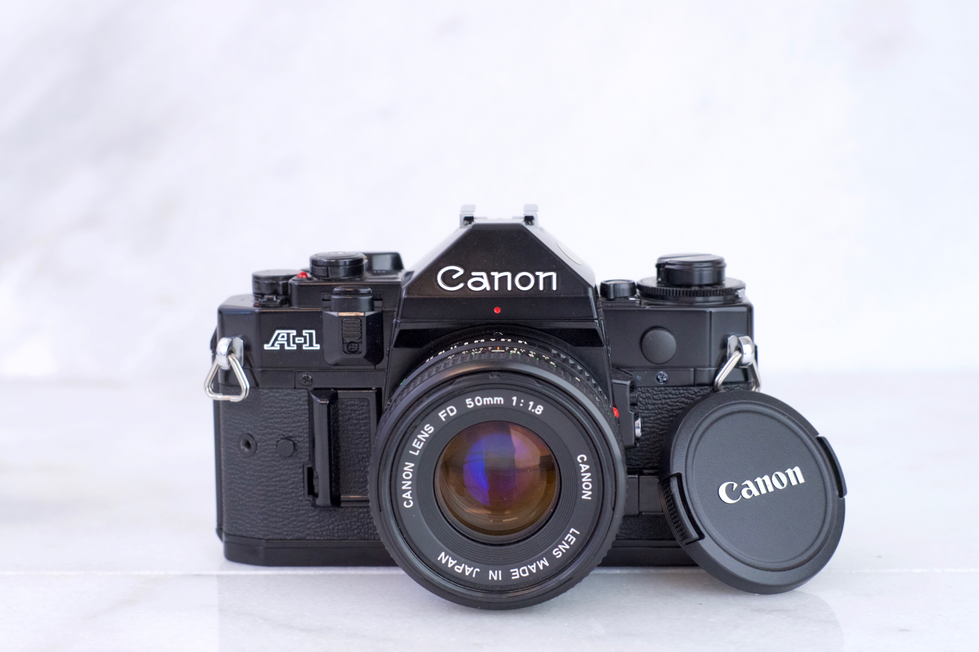Canon A-1 35mm Film SLR Camera with Canon FD 50mm F 1.8 Lens, Strap, Battery - Fully Functional and Pristine