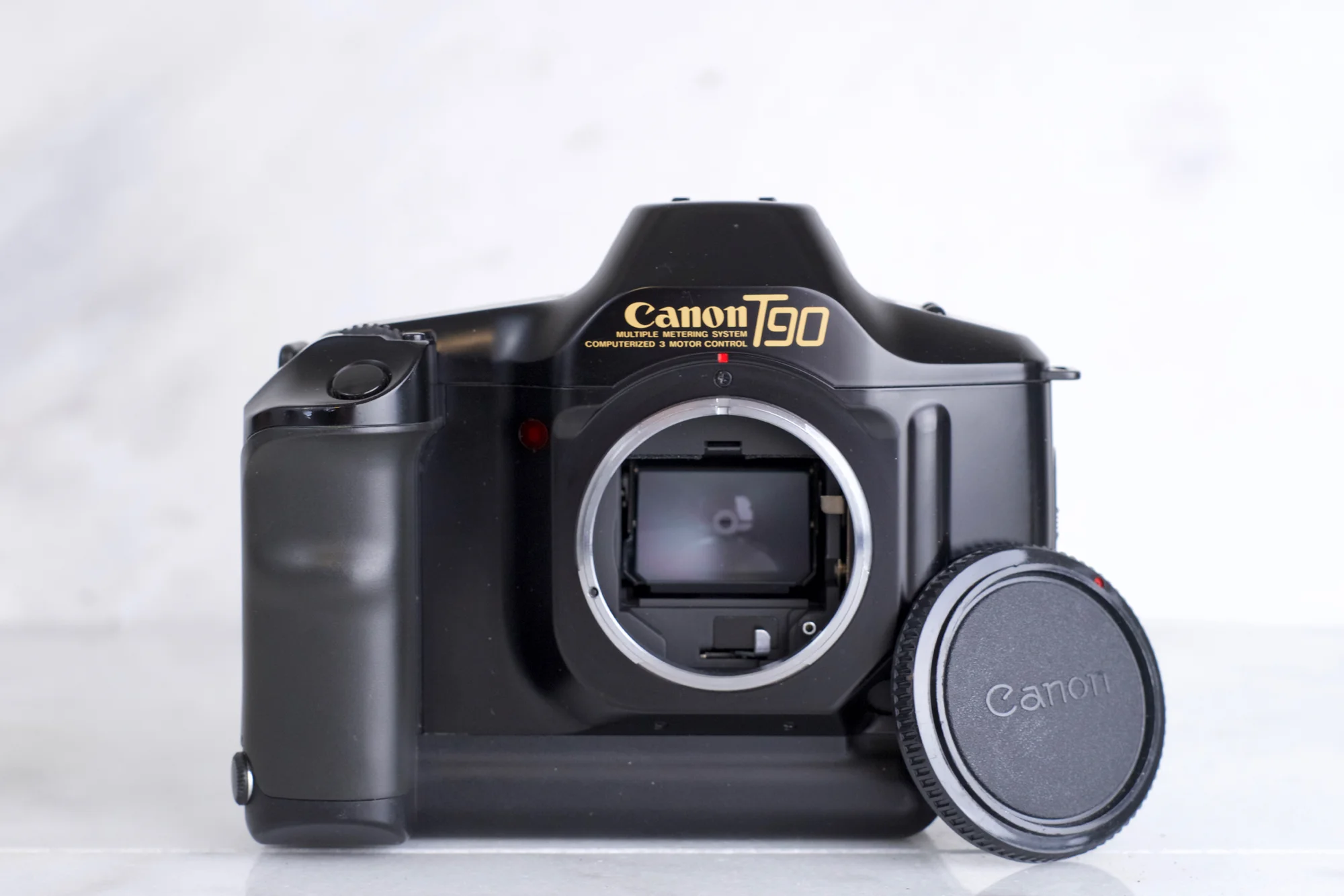 Canon T90 SLR 35mm Film Camera Body with Body Cap - Fully Functional with Batteries