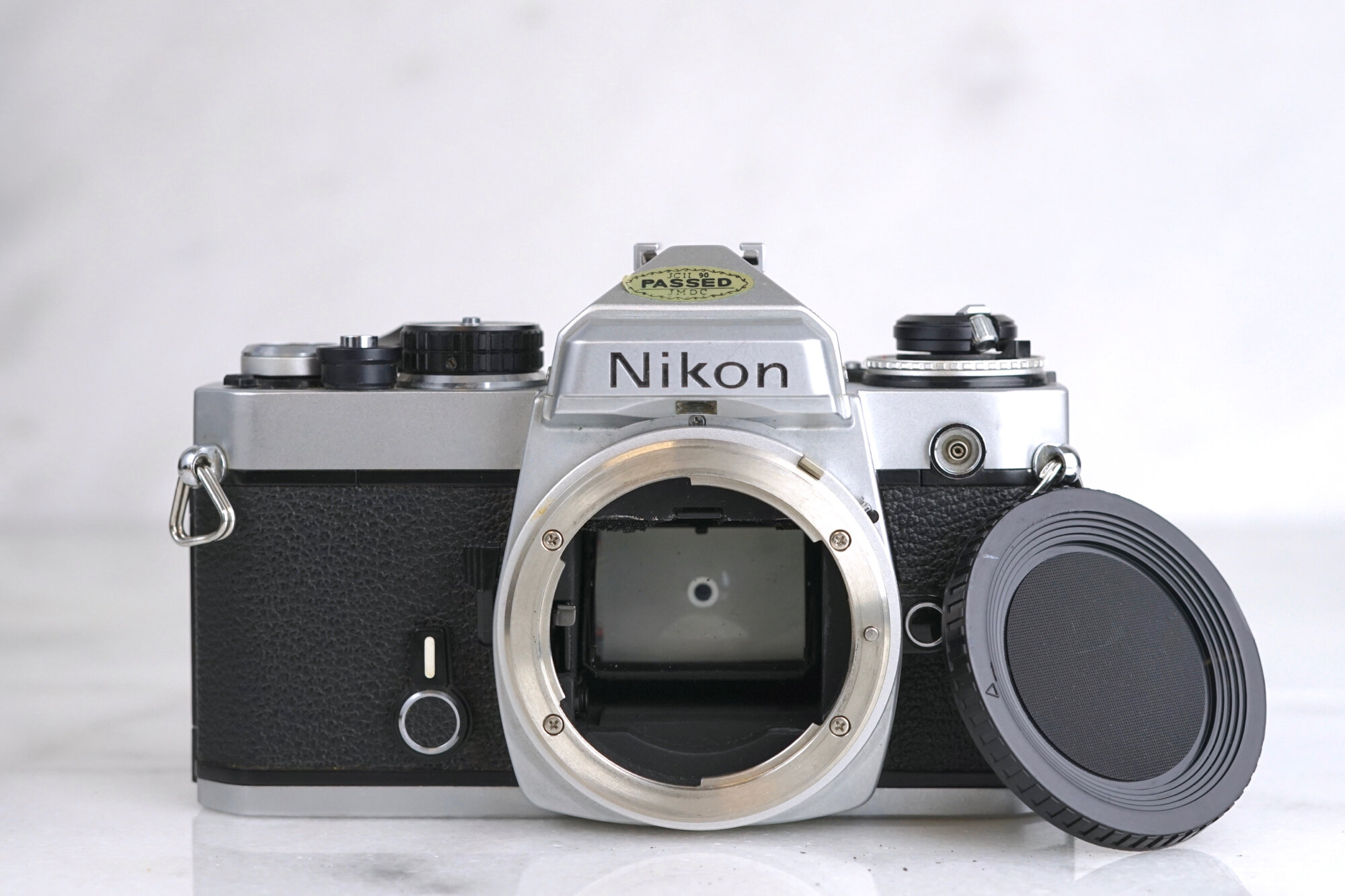 Nikon FE 35mm SLR Camera with Nikon Series E 50mm F/1.8 Fast Prime Lens and UV Filter - Fully Functional, New Batteries