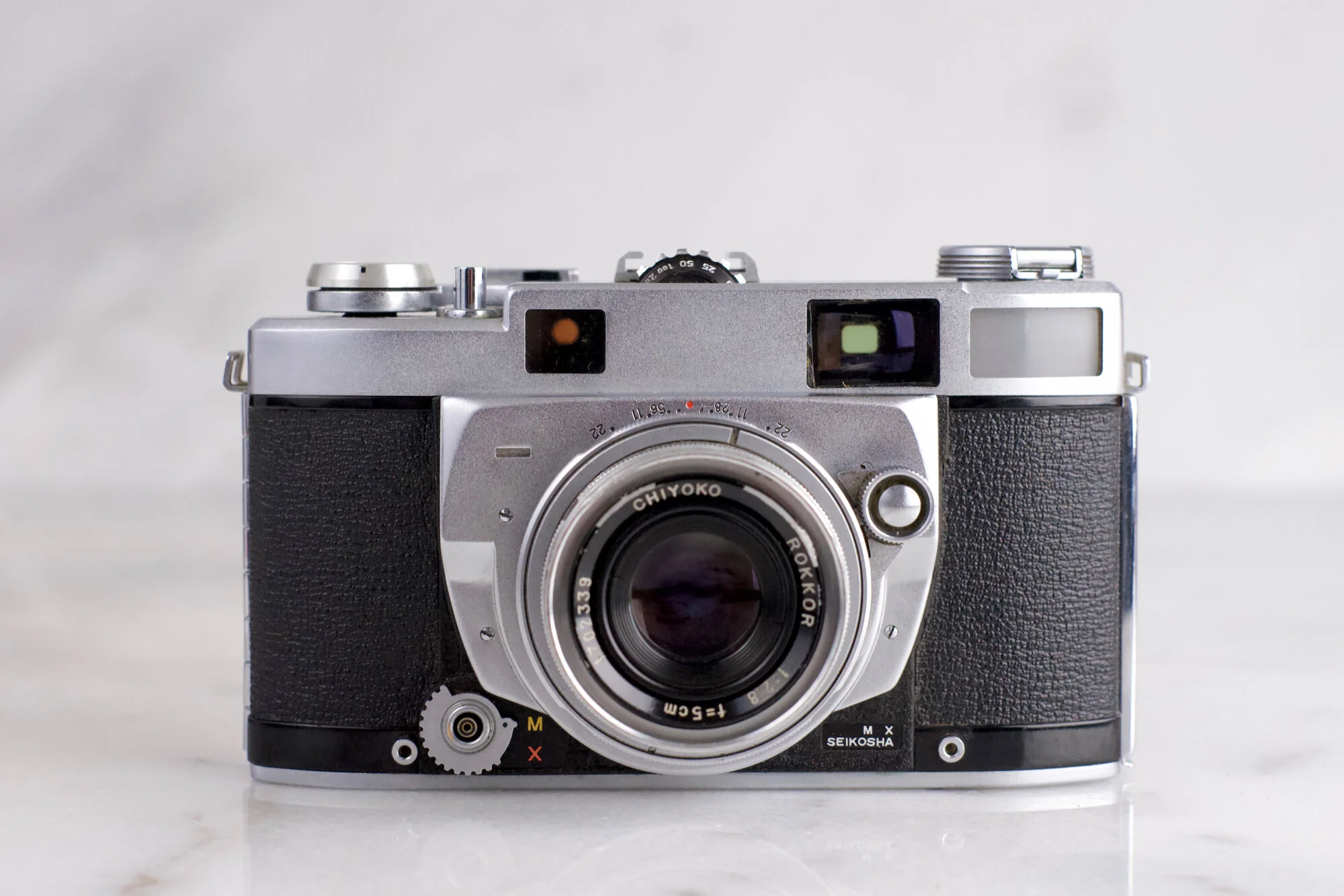Minolta Super A 35mm Rangefinder Film Camera with Rokkor 50mm Prime  Lens and Lens Cap Fully Functional — F Stop Cameras