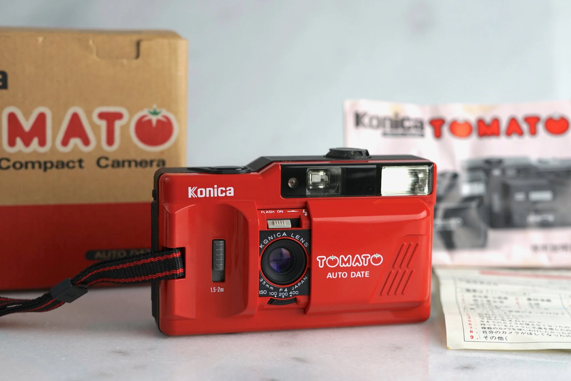 Konica Tomato 35mm Point and Shoot Film Camera with Original Box and Paperwork