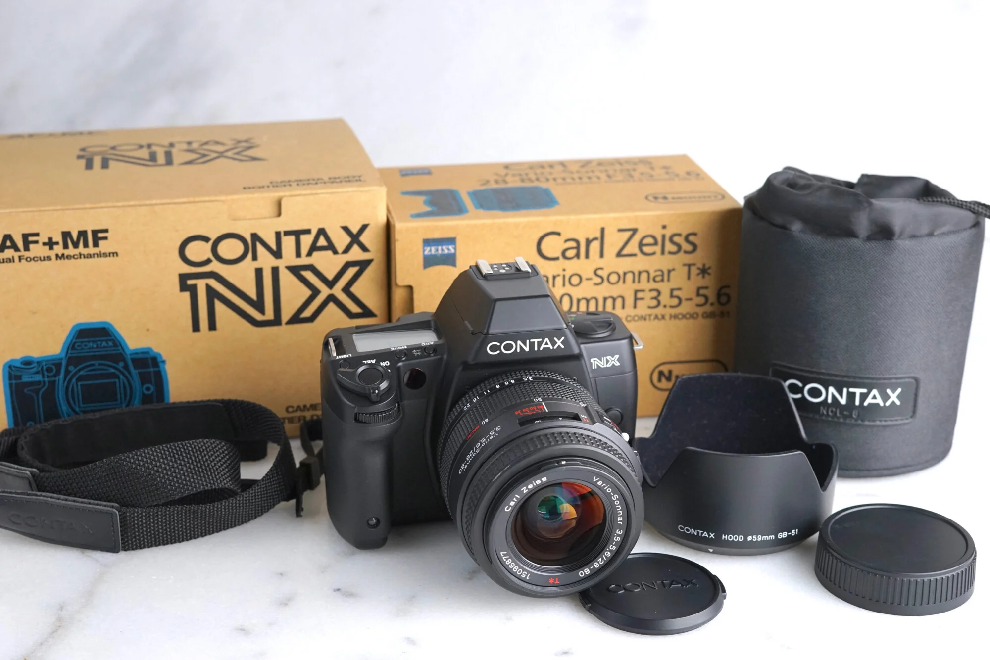 Contax NX 35mm Film Camera with Carl Zeiss Vario Sonnar 28-80mm f/3.5-5.6 Lens, Boxes, Caps, Case, Hood - Pristine, Like New