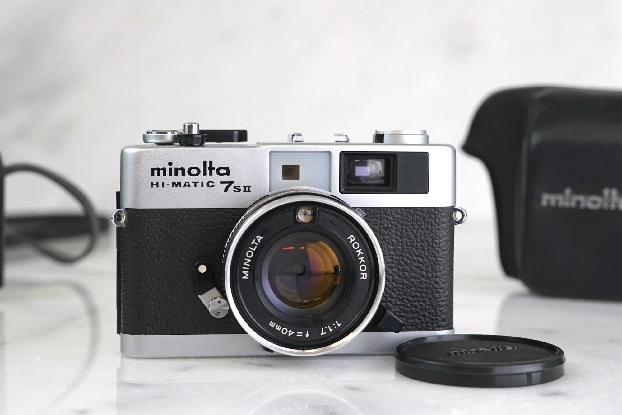 Minolta Hi-Matic 7s 35mm Film Rangefinder Camera with Ever-Ready Case and Batteries