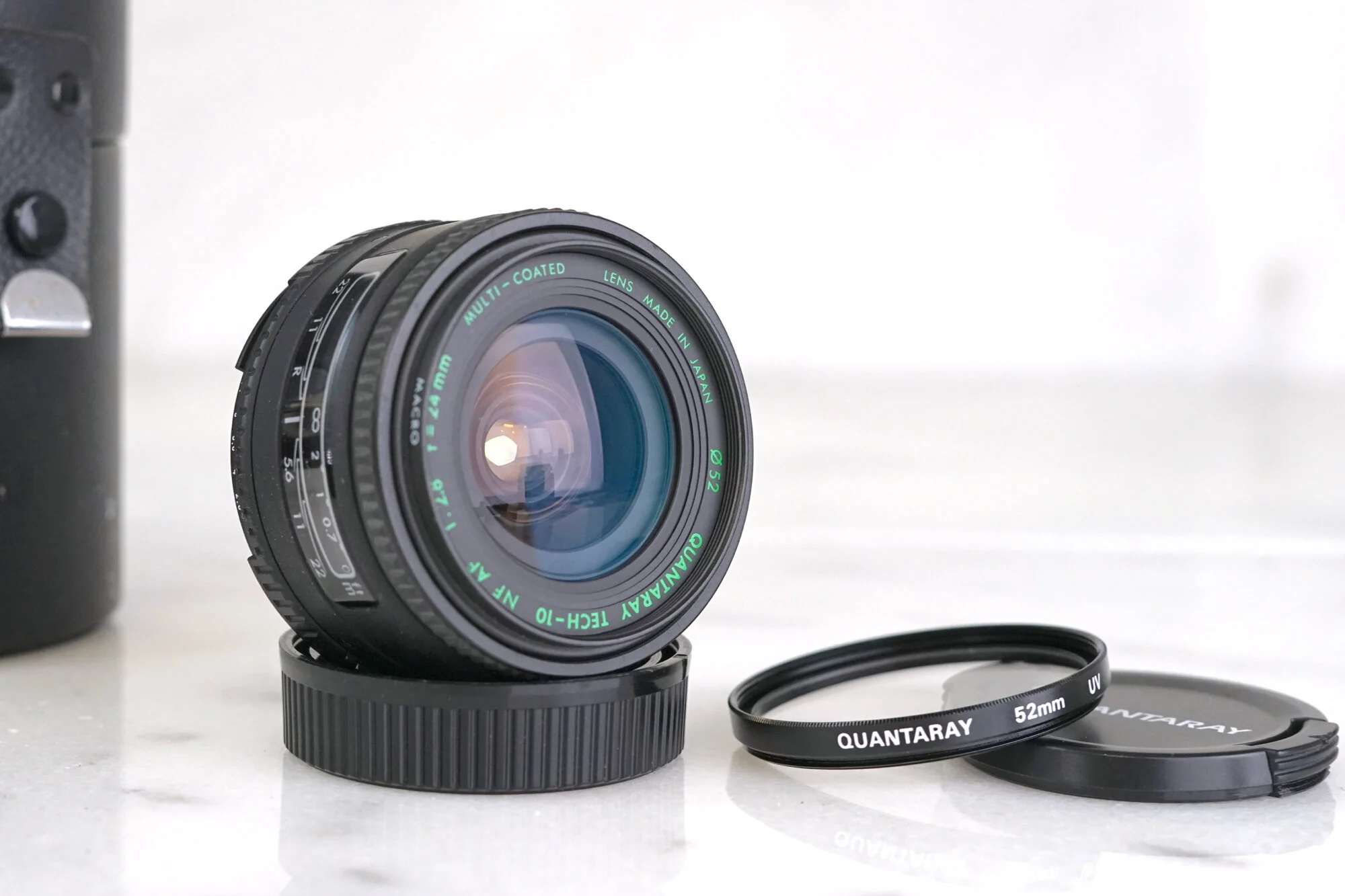 Nikon Autofocus F Mount Quantaray Tech-10 24mm F/2.8 Multi Coated Wide Angle Lens with Caps, Case, and Uv Filter