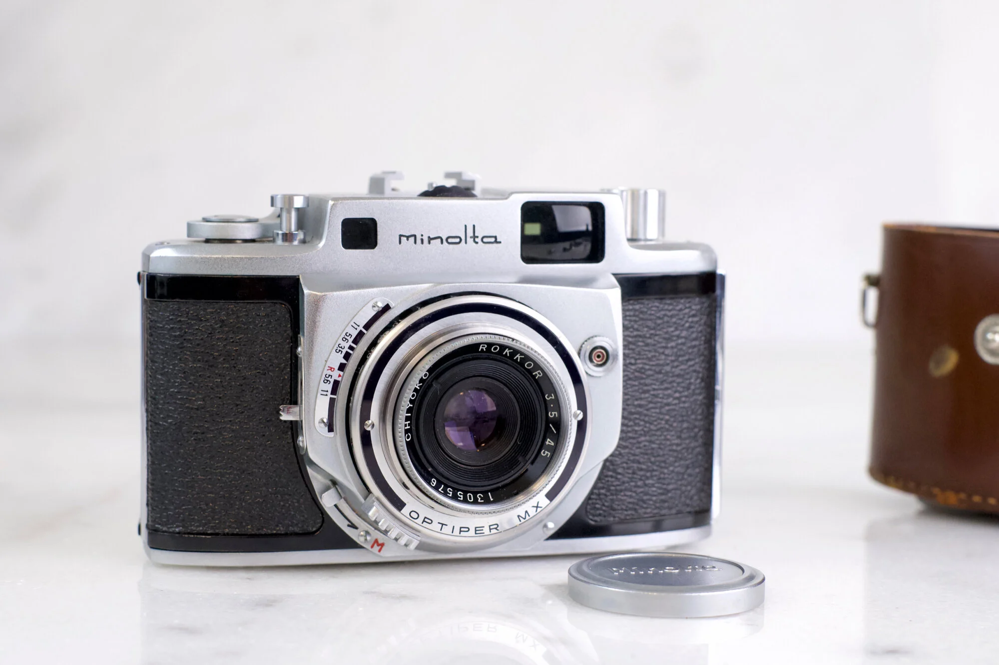 Minolta A 35mm Rangefinder with 45mm Rokkor Lens- Fully Functional with Lens Cap and Half Case
