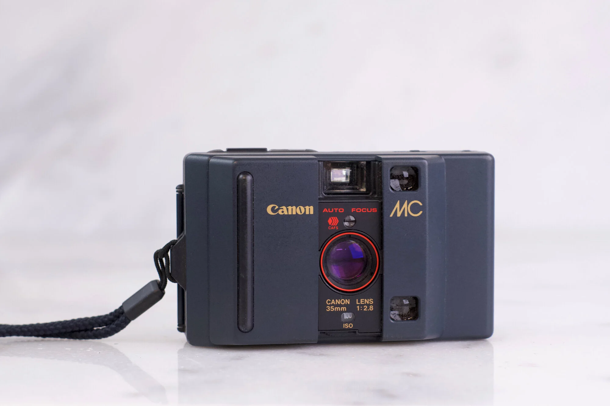 Canon MC 35mm Point and Shoot Film Camera with Strap