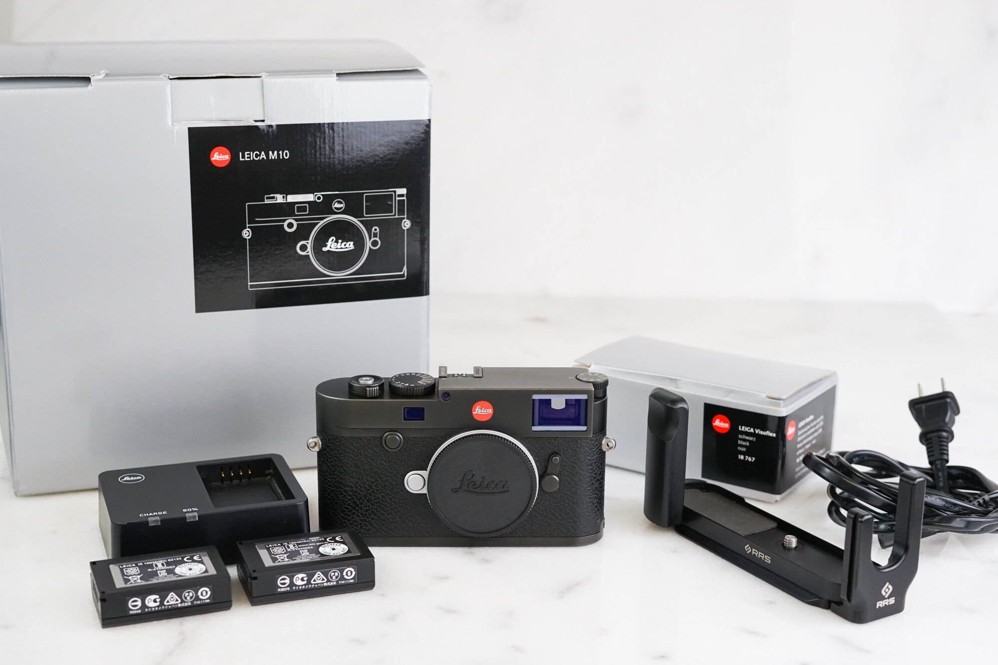 Leica M10 Bundle - with RRS Grip and L Bracket, Leica Visoflex Electronic Viewfinder, 3 Leica Batteries, Charger, Box, Papers, Packaging