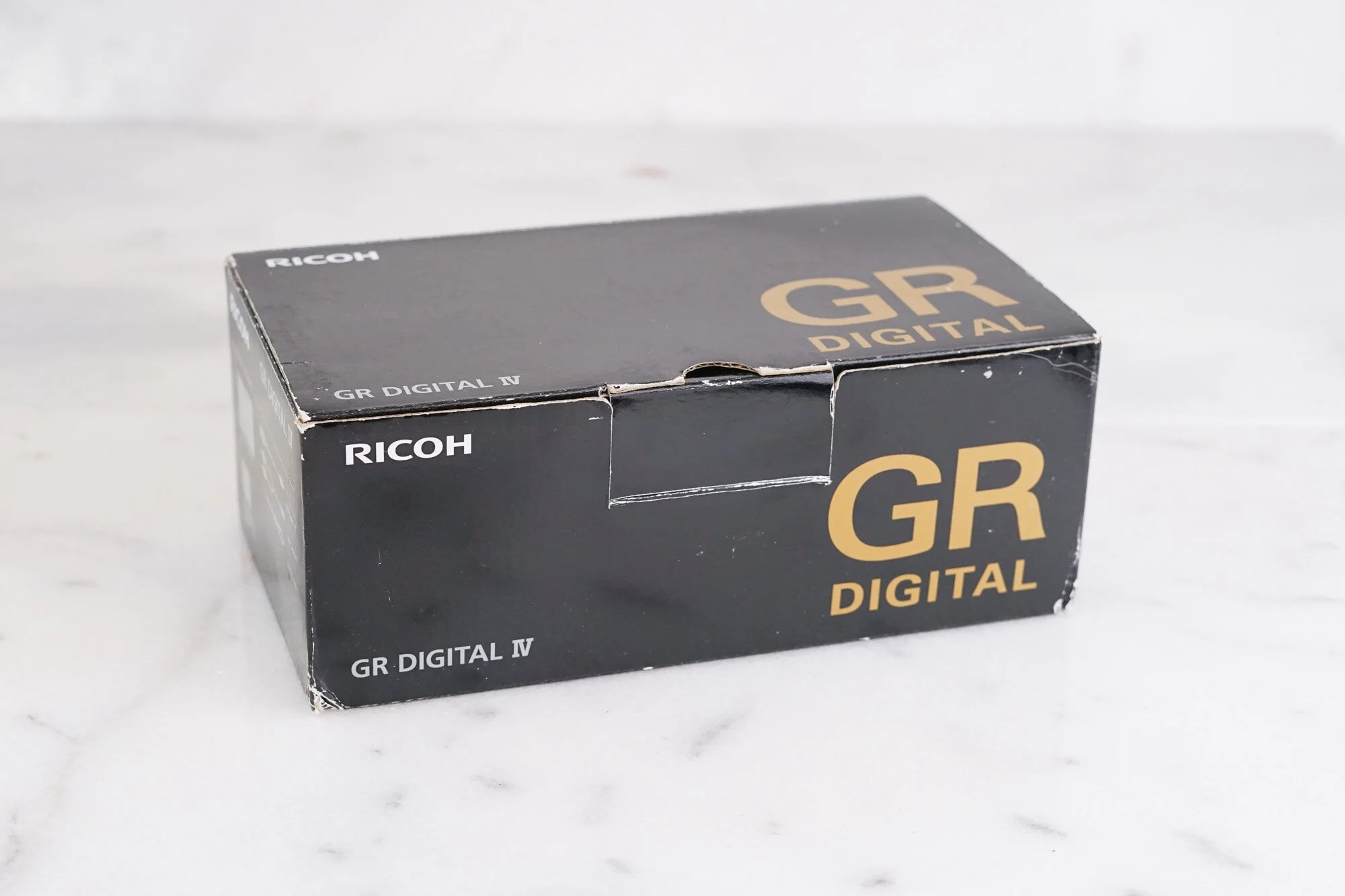 Ricoh GR Digital IV (GRDIV) 10 MP Compact Premium Digital Camera with Original Box, Papers, Charger, Two Batteries, Straps