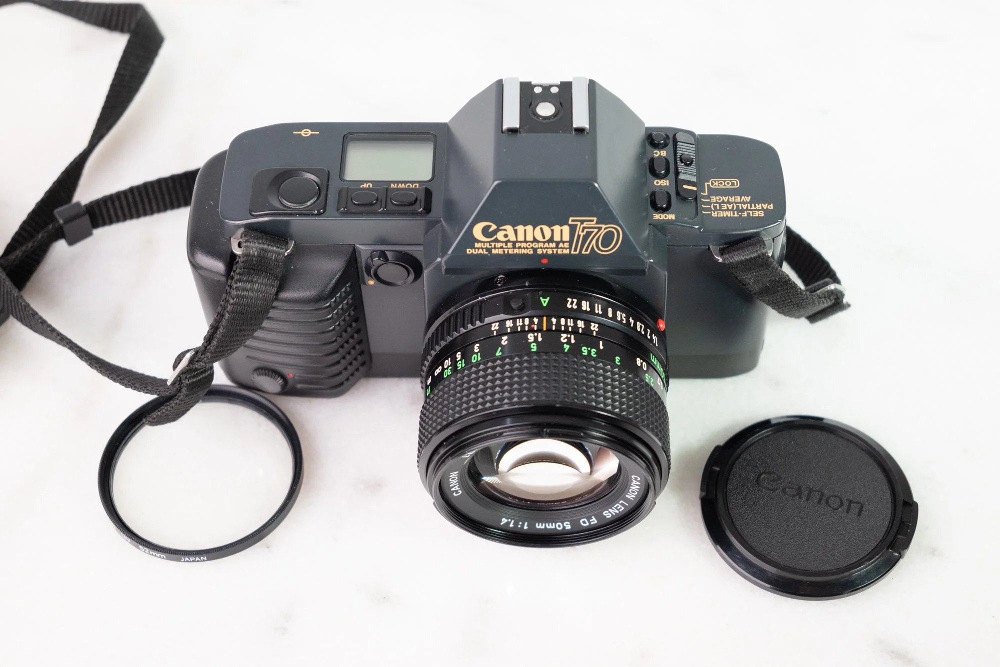 Canon T70 SLR 35mm Film Camera with Canon 50mm Fast Prime