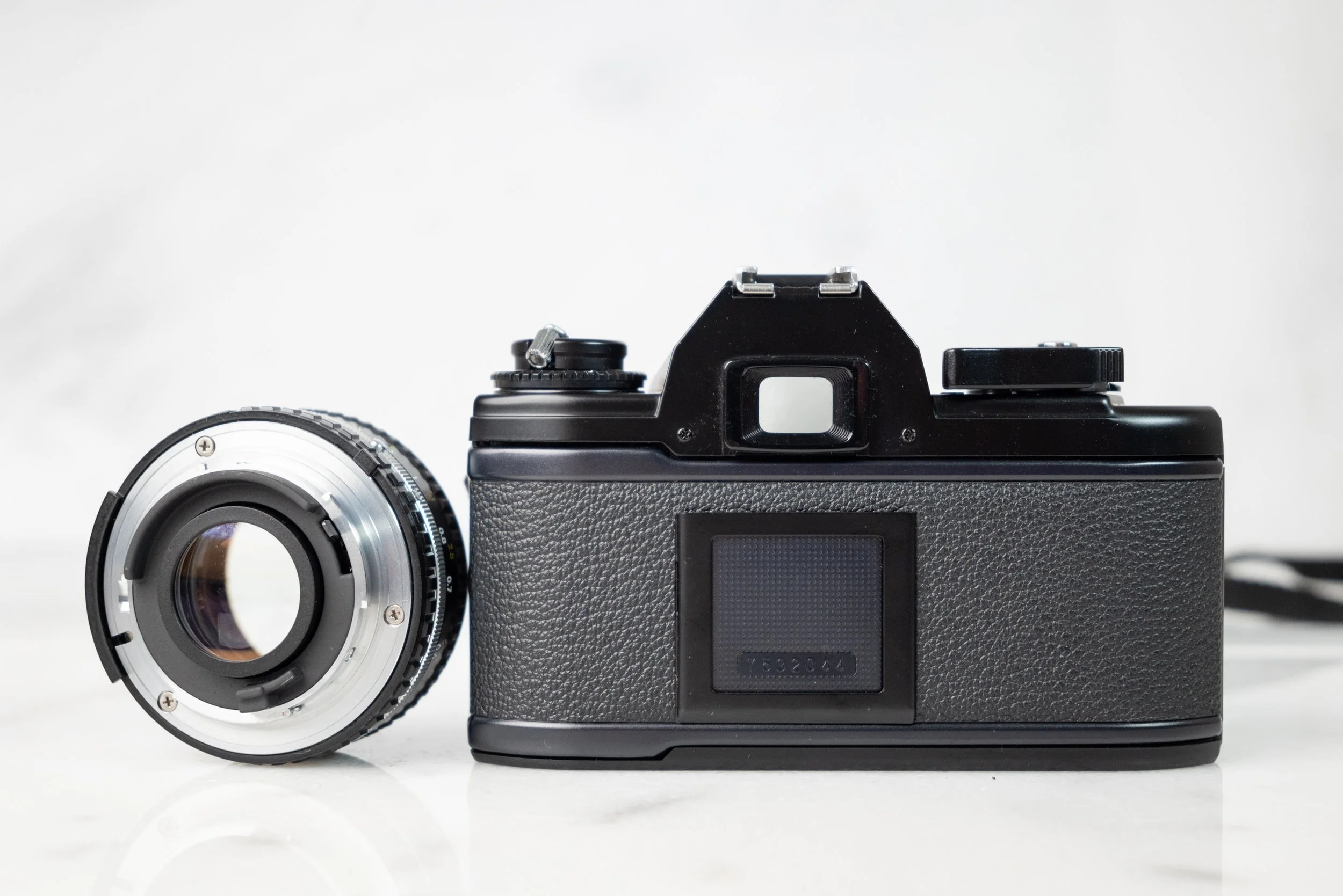 Nikon EM 35mm Film SLR Camera with Nikon 50mm F/ Series E Lens