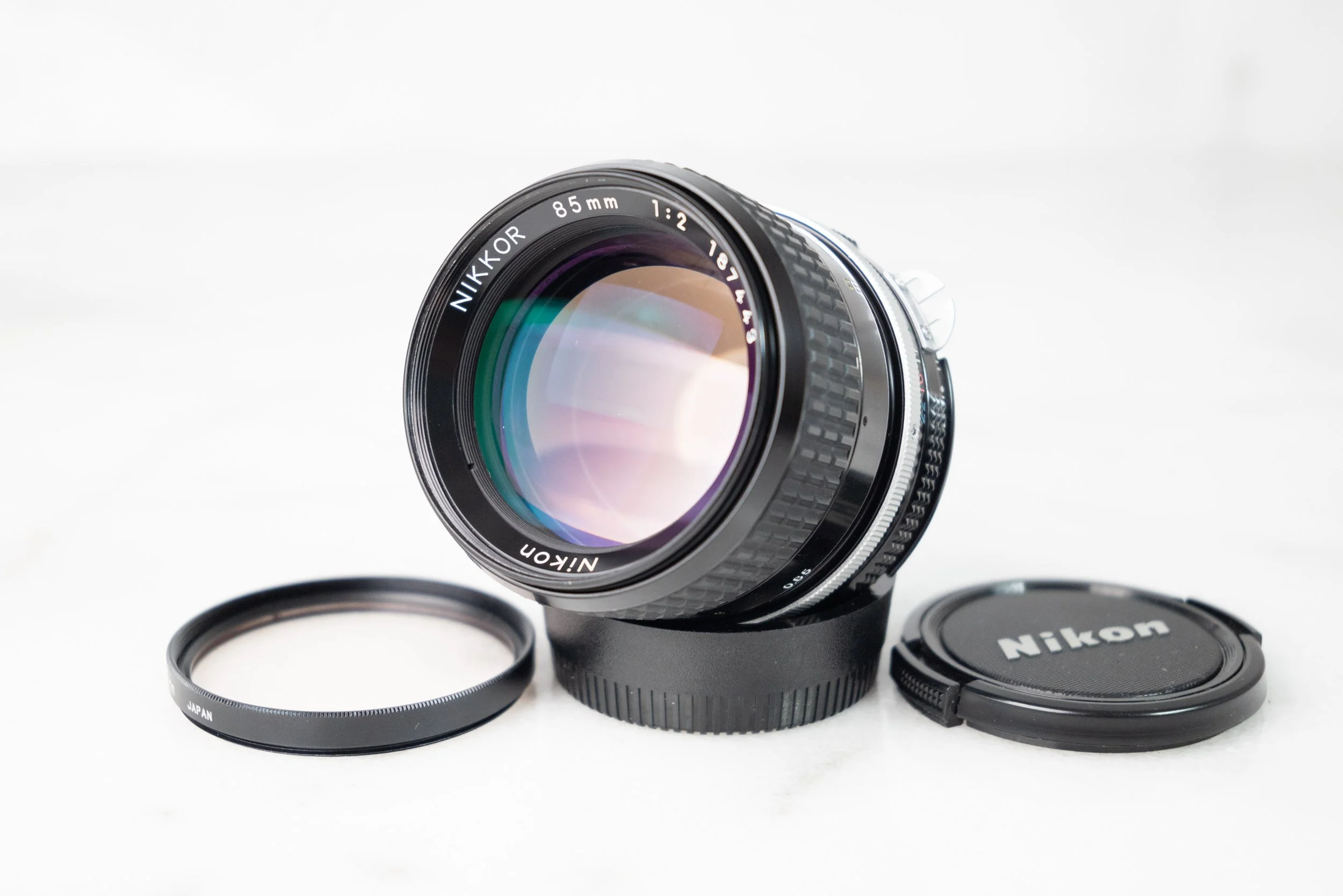 Nikon Nikkor AI 85mm F/2 Fast Prime Lens with Filter and Lens Caps