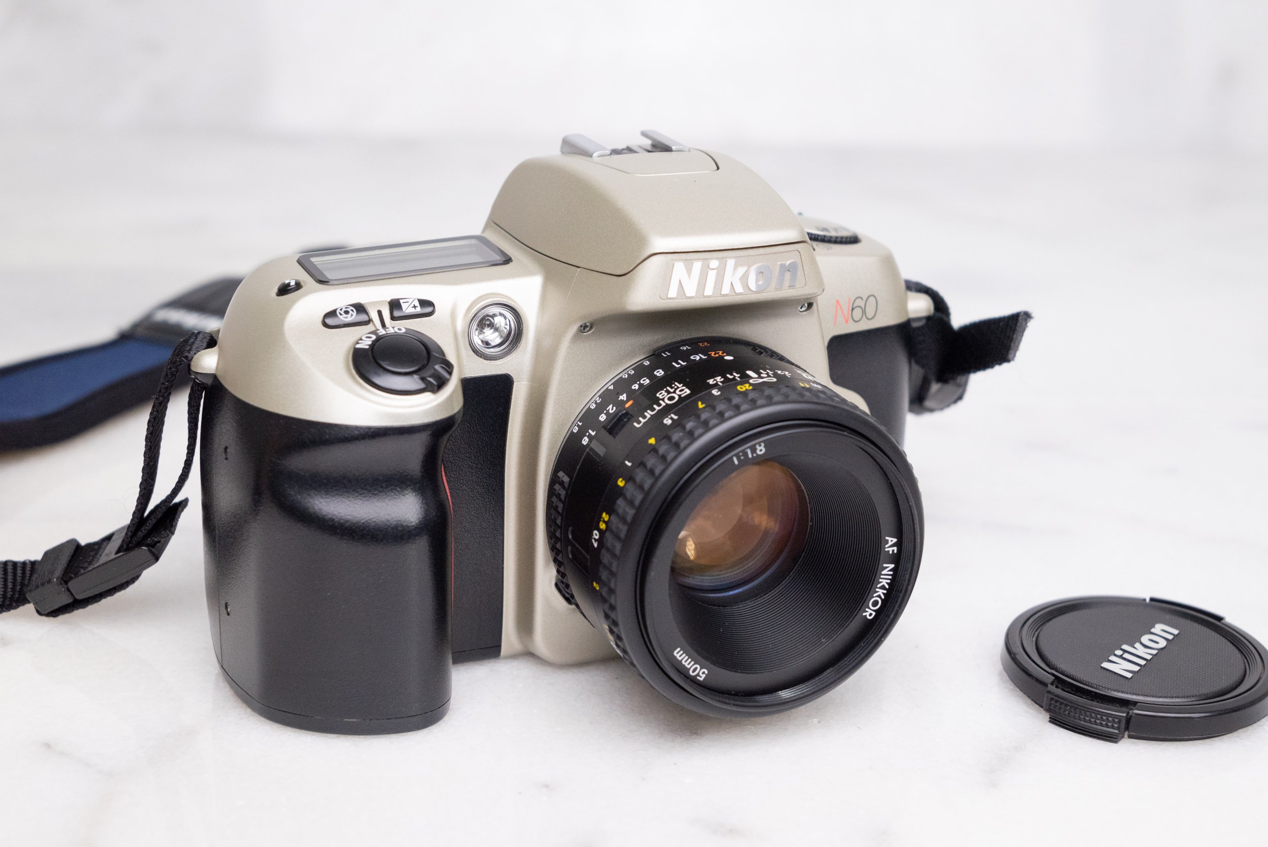 Nikon N60 35mm Film SLR Camera with Nikon AF Nikkor 35-80mm F4-5.6 Zoom  Lens, Lens Cap — F Stop Cameras
