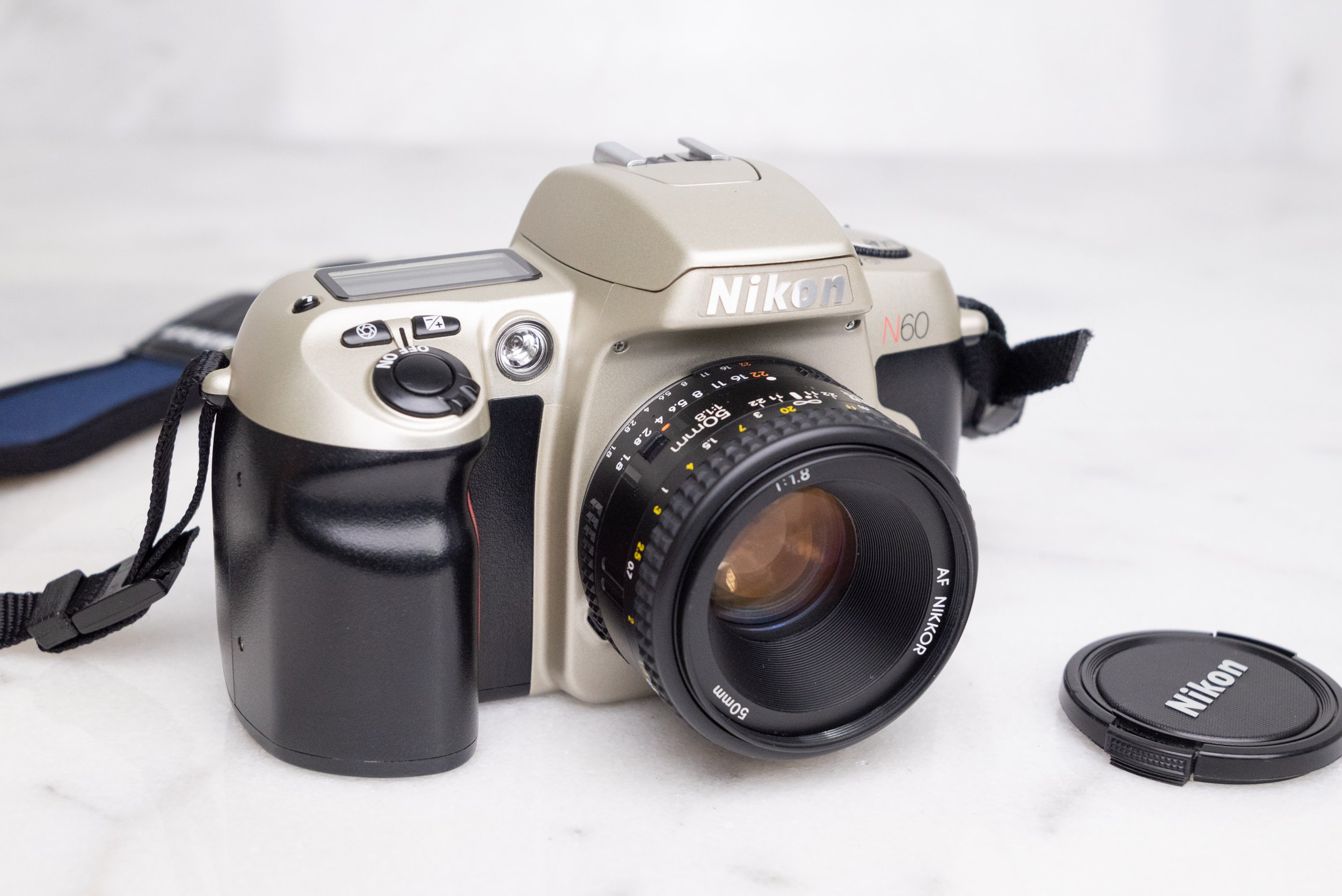 Nikon N60 35mm Film SLR Camera with Nikon AF Nikkor 35-80mm F4-5.6 Zoom Lens, Lens Cap