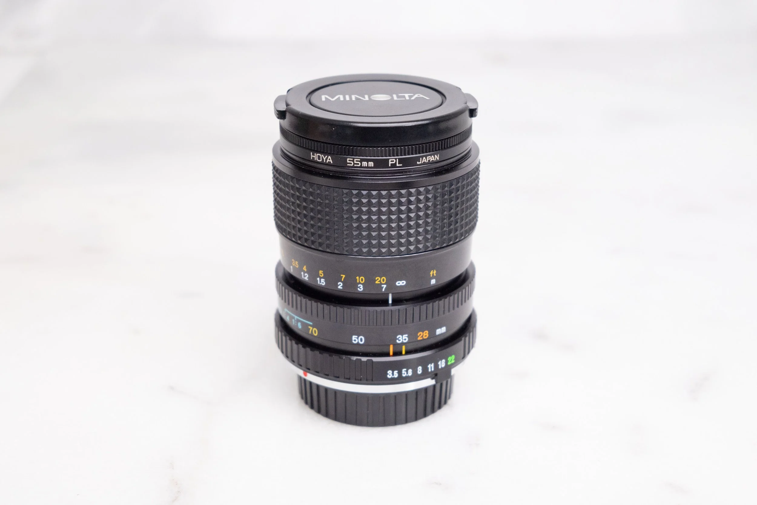 Minolta MD Zoom 28-70mm F/3.5-4.8 Zoom Lens with Front and Rear Caps and Polarizing Filter