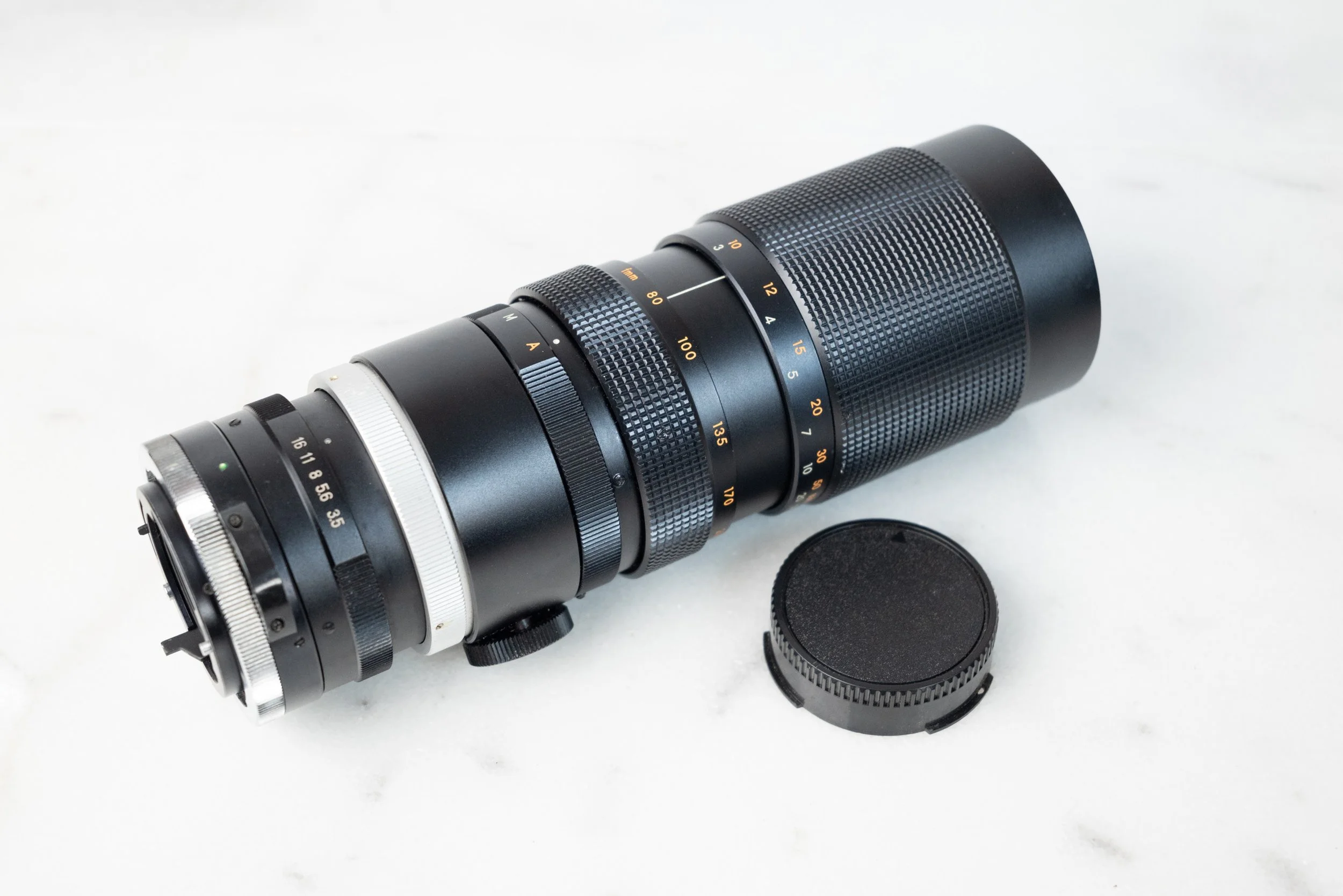 Canon FD 80-210mm F/3.5 Zoom Lens by Polaris with Rear Cap - Macro Focusing Lens for all FD Mount Canon Cameras