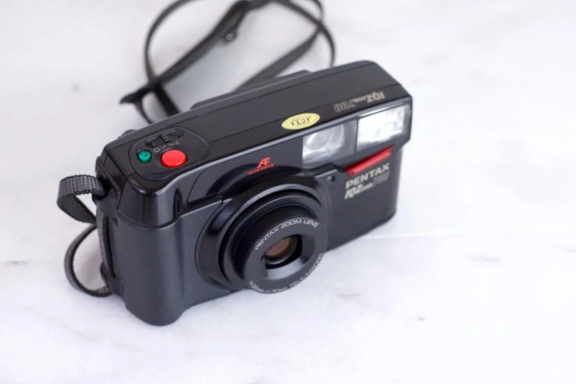 Pentax IQ Zoom 700 Autofocus Point and Shoot 35mm Film Camera