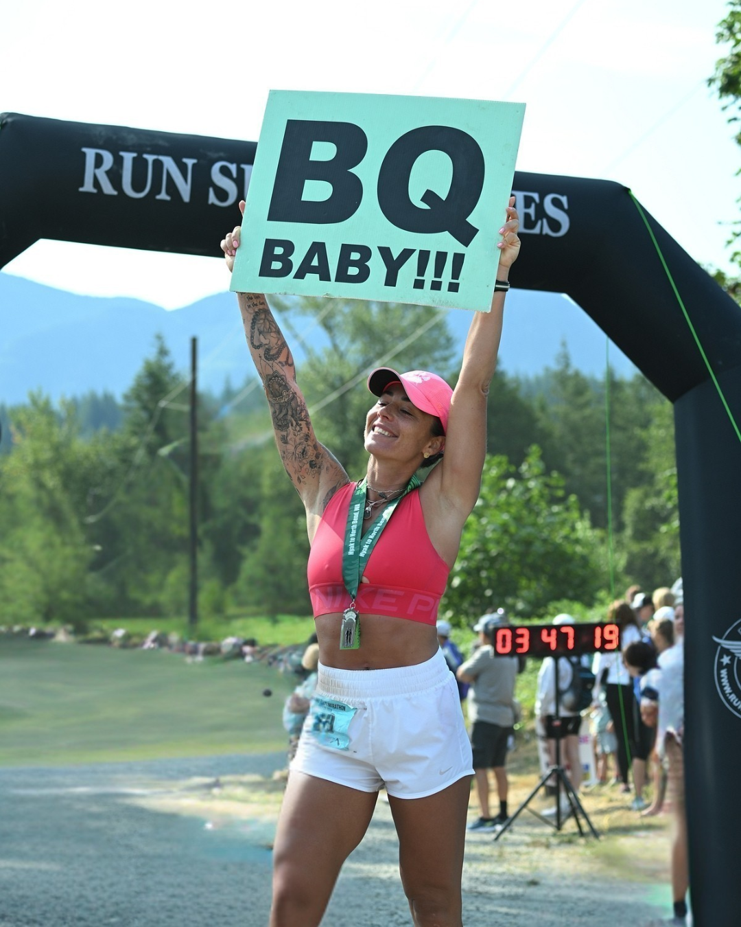 Runner Celebrating Boston Qualifier at Jack and Jill Marathon WA