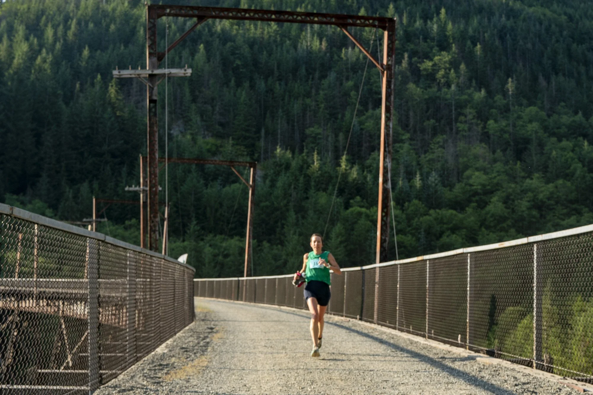 runner on bridge tressel at jack and jill marathon and half