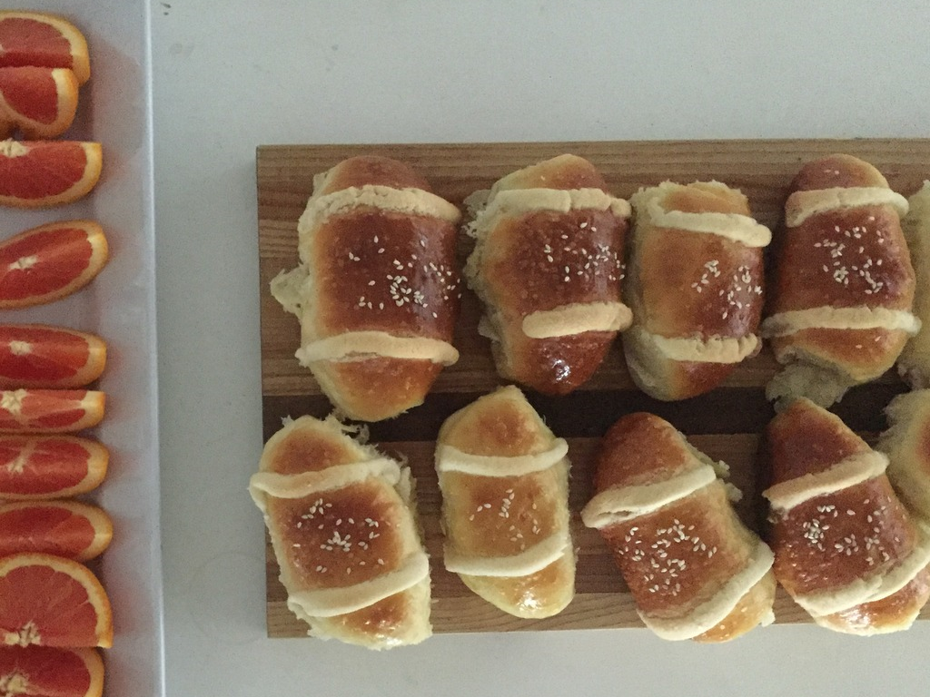 Breakfast coconut "bao" (buns) fresh from the oven, served with Cara Cara oranges.