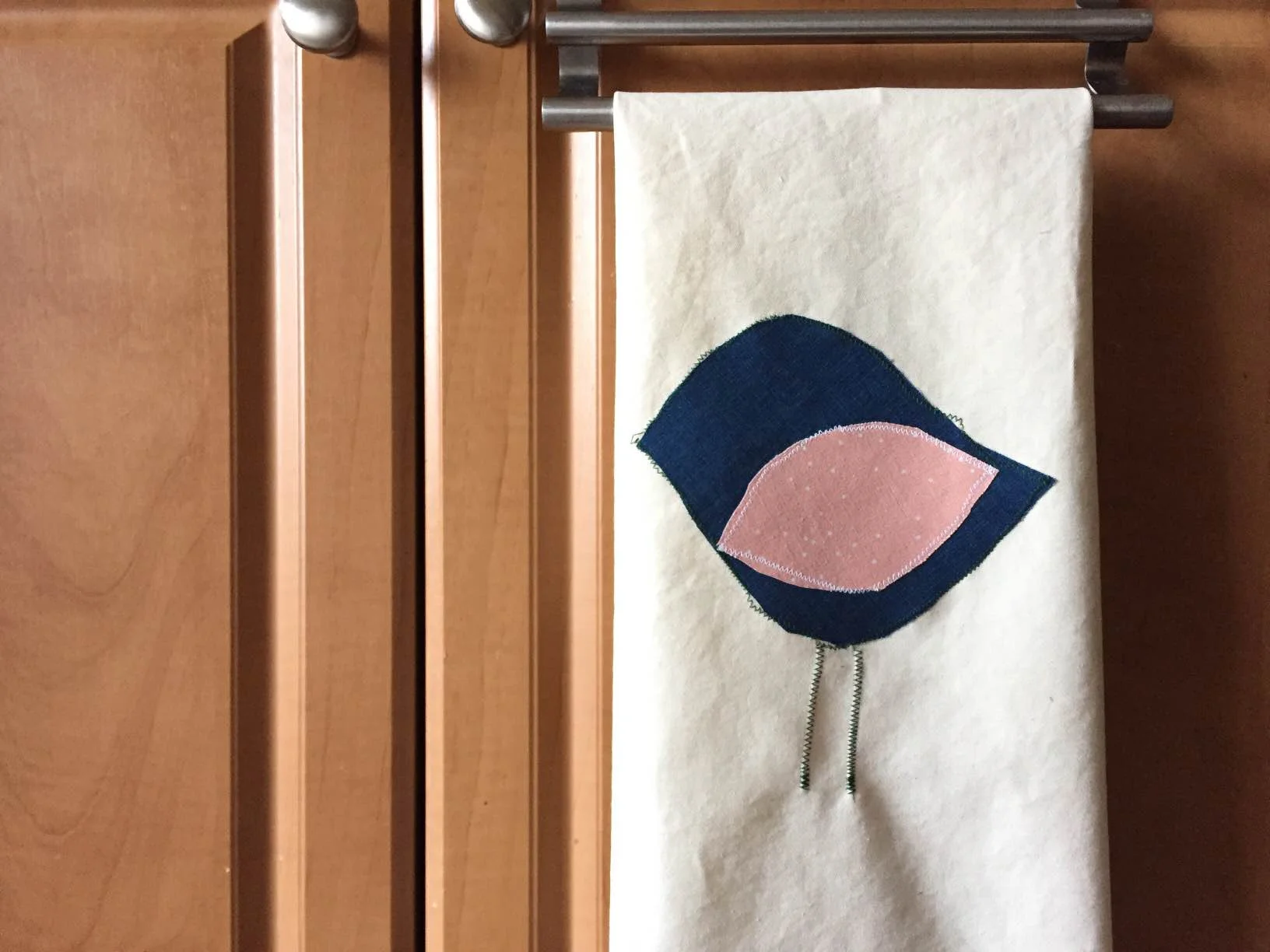 Above birdie sewn by Lily (age 5)