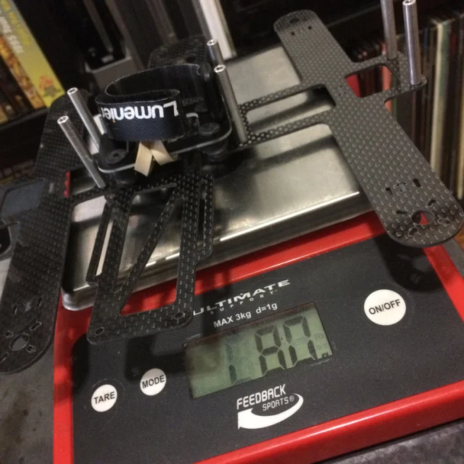 The carbon frame is lighter even though I got rid of the arm cutouts. The ESC’s block them anyway, and any extra strength is welcome. Most people weigh their frames without a battery strap and cam mount. Without them it's 70 grams.