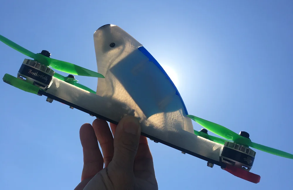 You can see the esc's sitting vertically inside the arms. The angled battery aligns with the direction of flight for less drag, but it does create a lot of wasted space and extra pod weight.