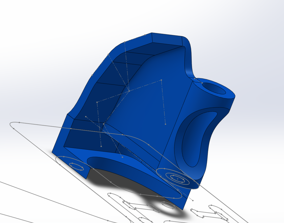 The surface is thickened to make it a solid, and the extra material on the noseguard cut away.
