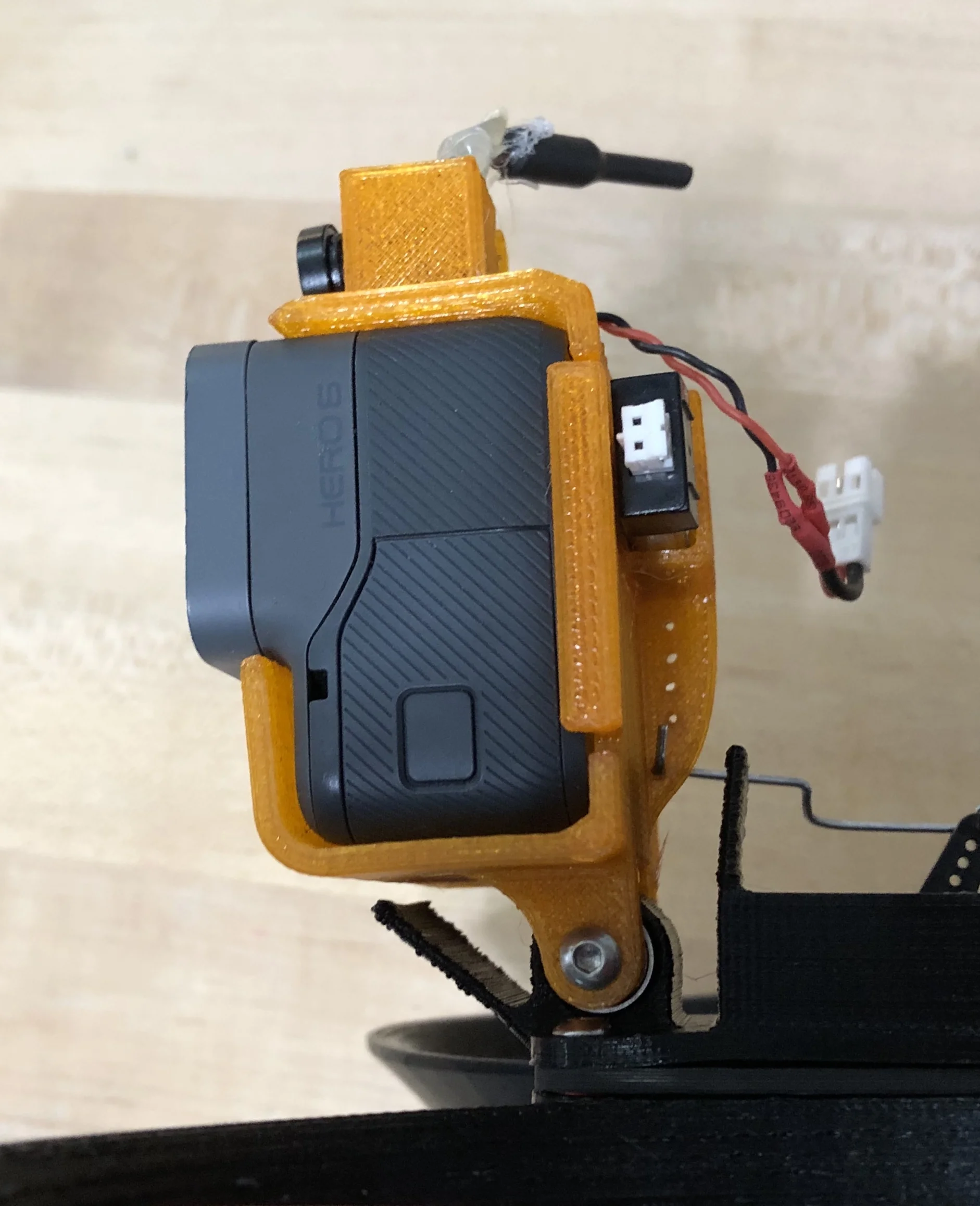 See those holes for the pushrod? They’re made with a hot wire since they’re a bit too small to resolve with printing.