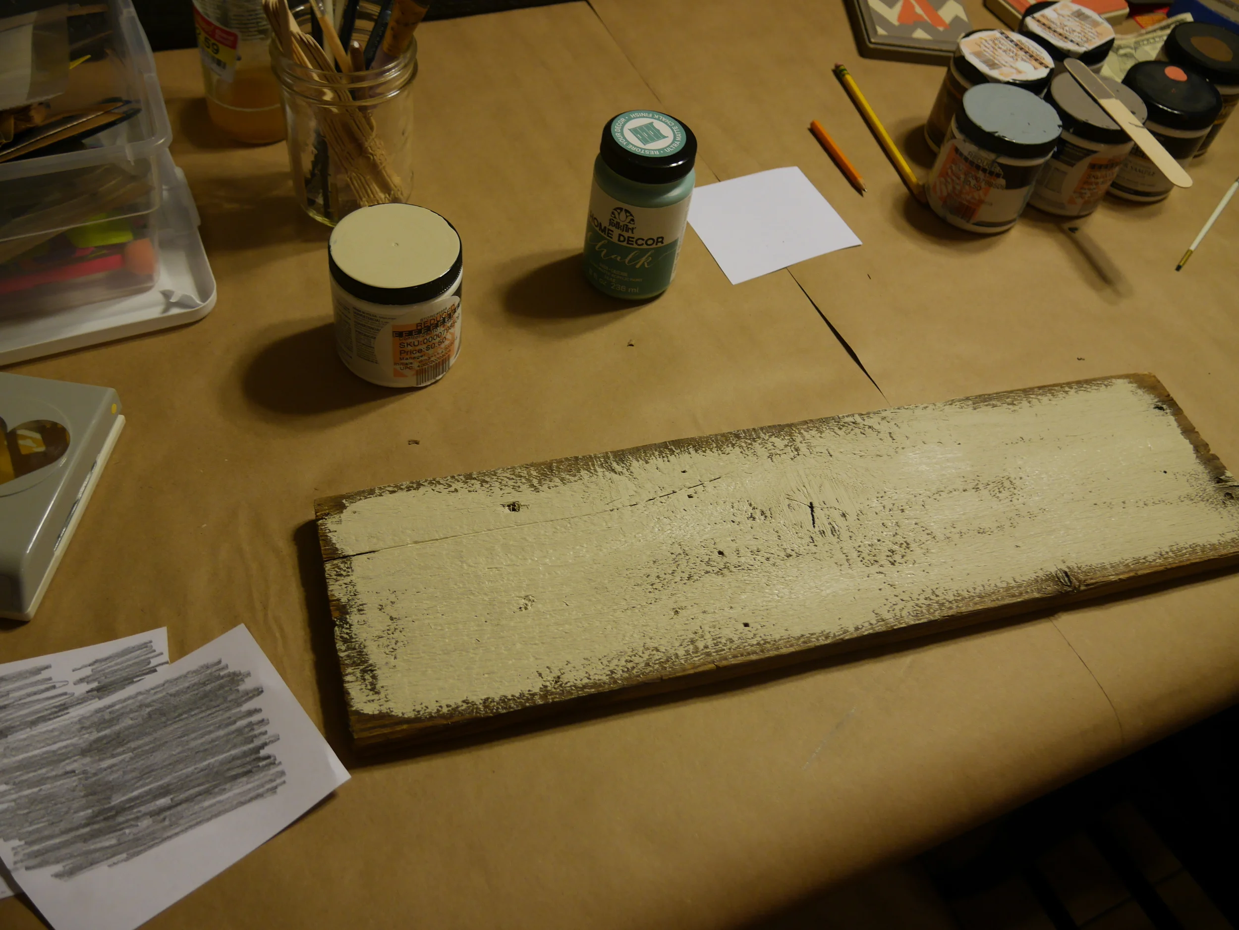 Here is my brother's sign, he painted it to look a little weather by not completely covering the wood board.