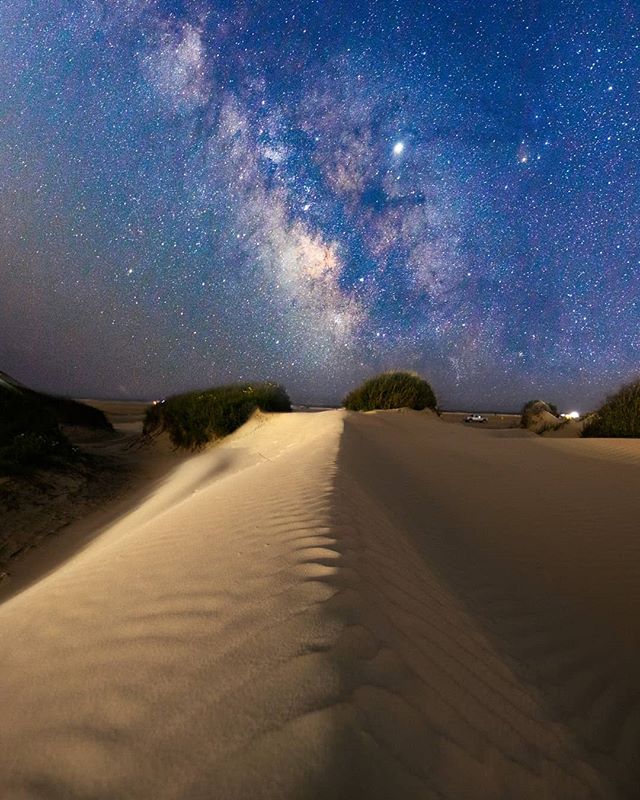 Milky Way over Galveston Island. I spent my memorial day weekend stumbling around in the deep sand while recovering from a nasty virus, and I have to say it was worth it! Despite feeling like I'd been hit by a FedEx truck, I managed to stay up late and catch this amazing view down at the dunes. The headlights from the nearby drunk-driving offroaders in their huge trucks cast off the perfect amount of light for the edge of the dune π
.
.
#igofhouston #canonusa #milkyway #houstonian #nightshooters #milkywaychasers #longexposure #instagood #igpodium_night #urbanandstreet #resourcemag #houston #milkywaychasers #astrophotography #igtexas #moodygrams #galaxy #exploretocreate #longexpo_addiction #createcommune #astrophotos #superhubs #createexplore #heatercentral #visualarchitects #visualambassadors #visuals #visualsoflife #teamcanon #stars