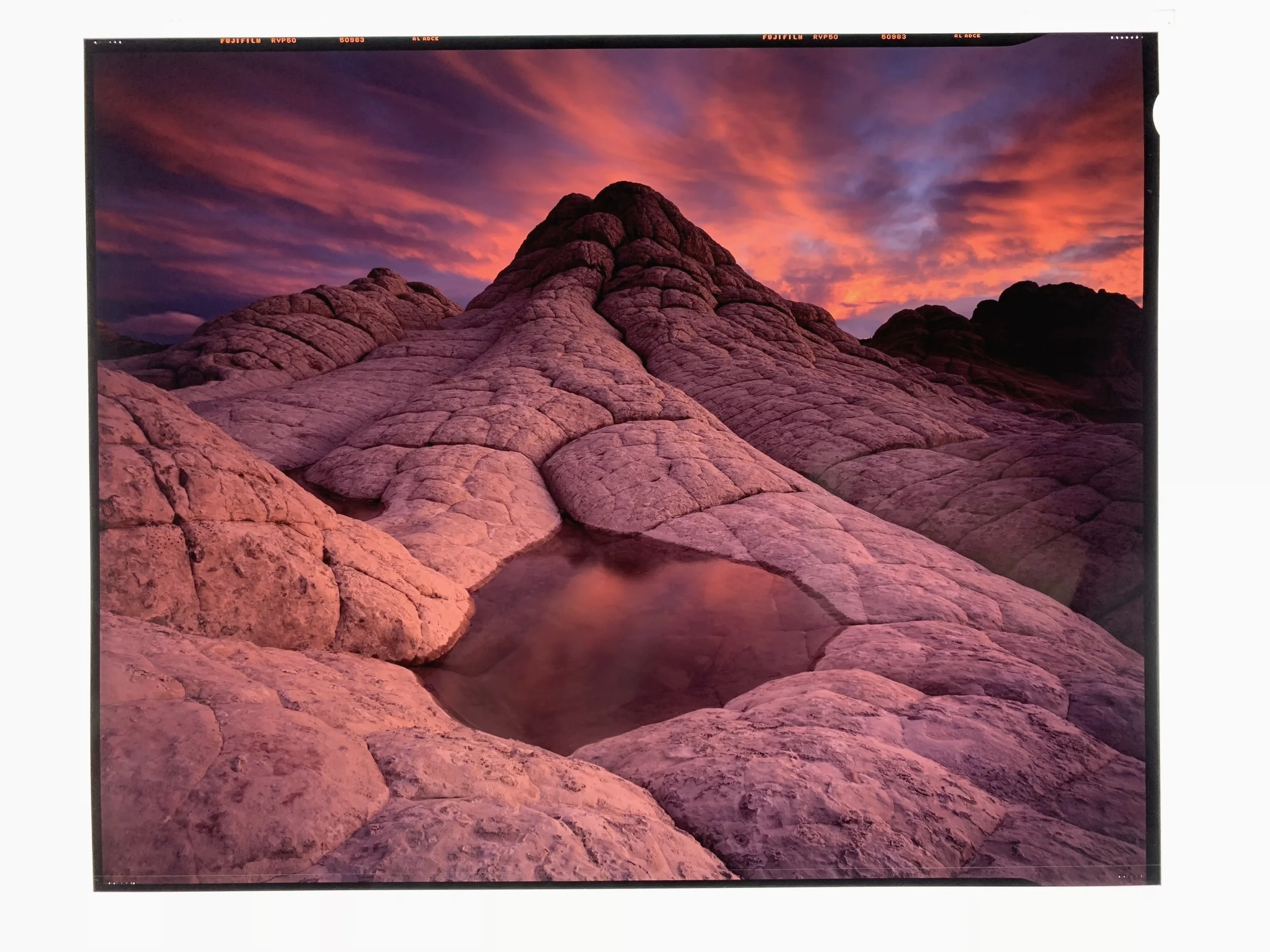 A single sheet of 8x10” Fuji Velvia 50, as it sits on my light table. This image is available as a fine art print, in editions of 90, entitled “Eternal Flame.”