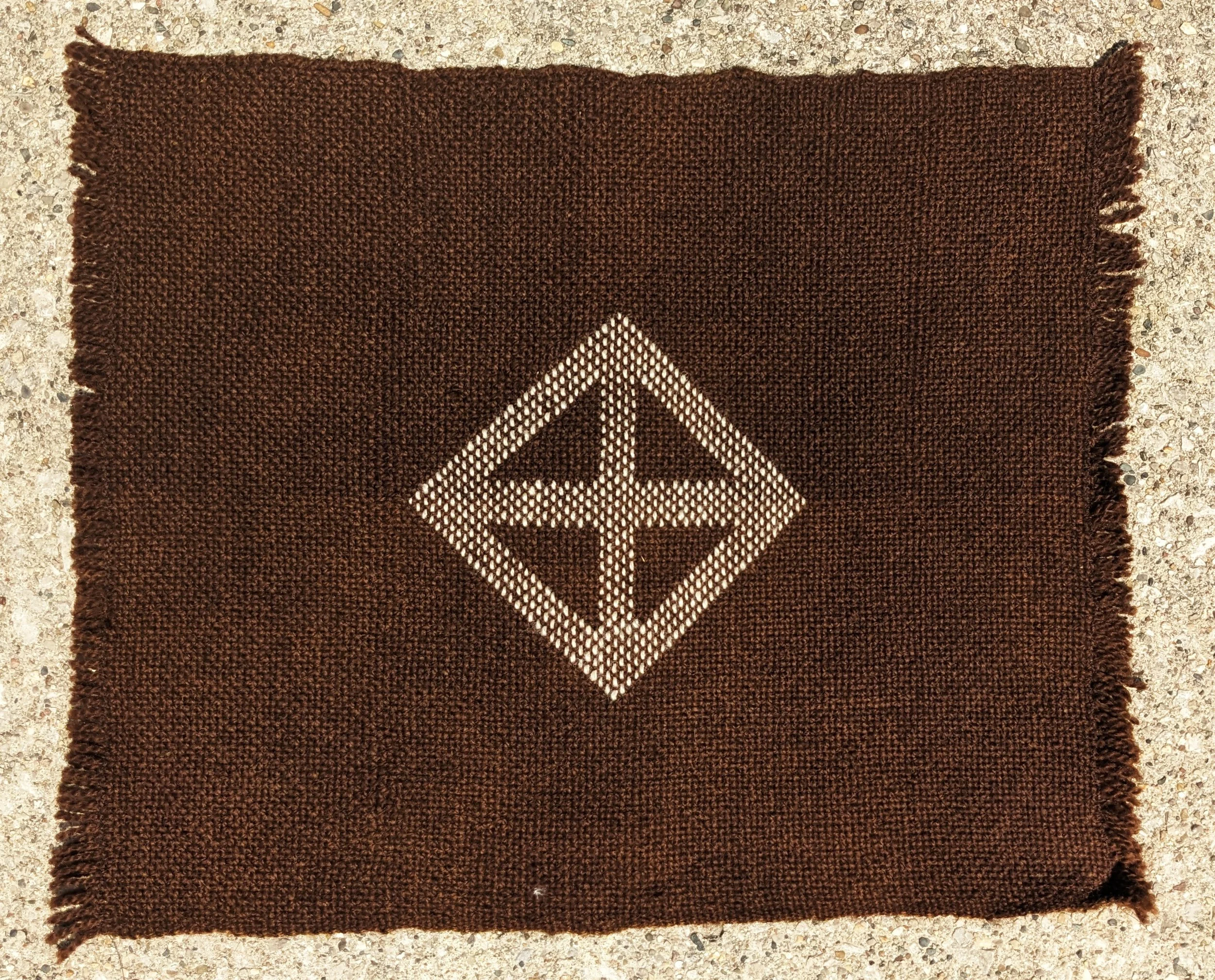 earth diamond pattern inlaid on black walnut dyed wool thread 19" x 15.5” available at Ox-Bow House in Douglas, MI